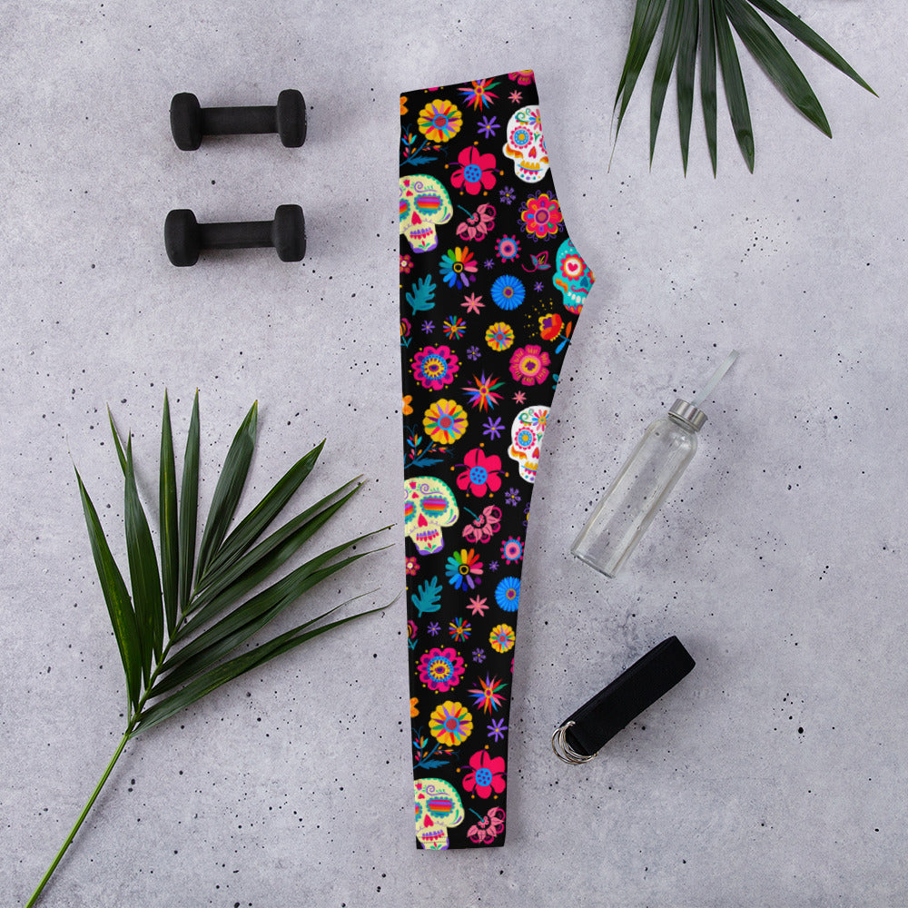 Vibrant and festive, these Día de los Muertos leggings for women feature sugar skull artwork and floral accents that celebrate Mexican culture. Available in sizes XS–XL with a comfortable mid-rise waistband, they’re ideal for Halloween, fall parties, and themed classroom looks. Made from a soft, stretchy blend that moves with you. Coordinates with toddler and youth leggings for matching family outfits.