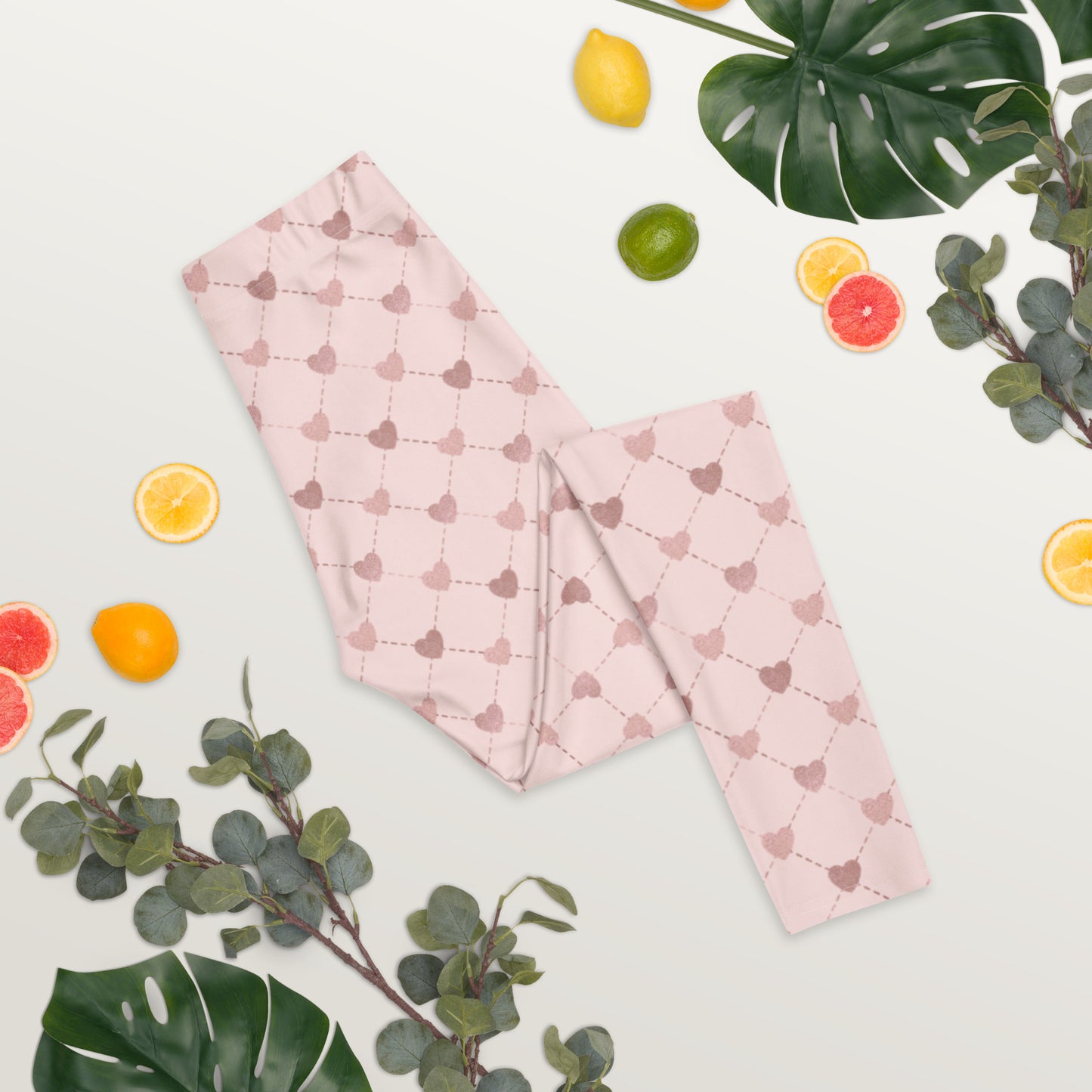 Image: Pale Pink Leggings with dainty heart accents. Available in sizes for toddler girls, teens, tweens and women. Perfect for Valentines day, or any family matching activity, by jaecrece
