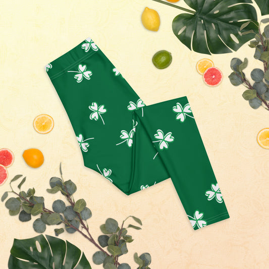 Green St Patricks Day leggings with white four leaf clovers. These lucky yoga pants have a mid rise waist and are full length to ankle. They are also available in toddler, girls and tween sizes for family matching outfits