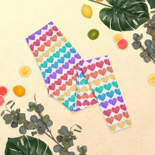 Celebrate color with our Women’s Rainbow Hearts Leggings, featuring vibrant rows of rainbow-colored hearts across full-length legs. These mid-rise leggings are perfect for Pride events, festivals, 5Ks, or bold everyday wear. Made of soft microfiber with four-way stretch, they offer a flattering fit and fun flair. Ideal for coordinated family outfits with matching toddler and youth sizes available.