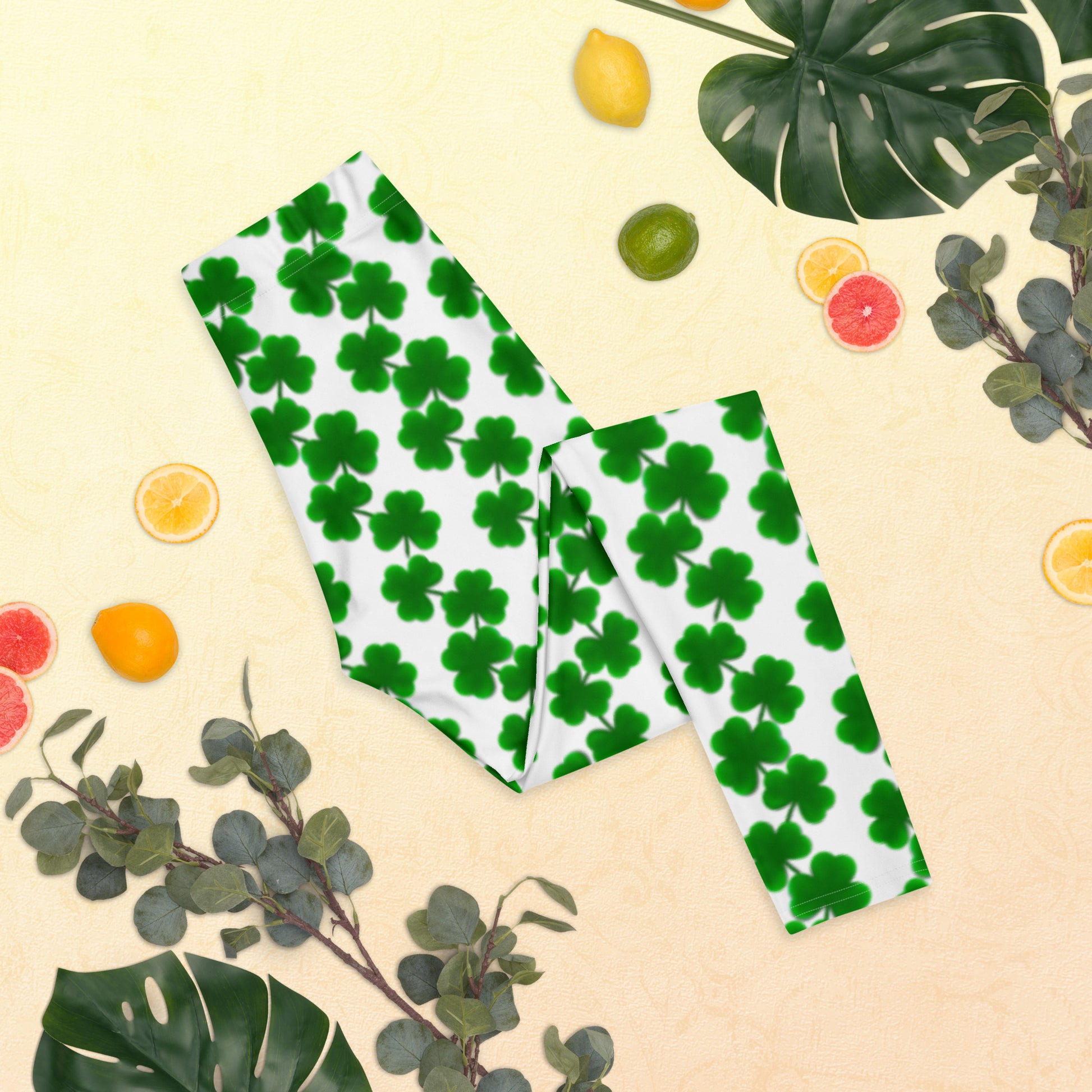 Image: St Patricks Day Lucky Shamrock Leggings for women. Celebrate St. Patrick’s Day in these fun and festive shamrock leggings for women. With a mid-rise fit and full-length legs, they’re made from soft, four-way stretch fabric for all-day comfort. Green clovers cascade down a clean white base, giving them a fresh and lucky feel. Pair with matching family styles for mom-and-me holiday looks. Perfect for parties, parades, or lounging in March.