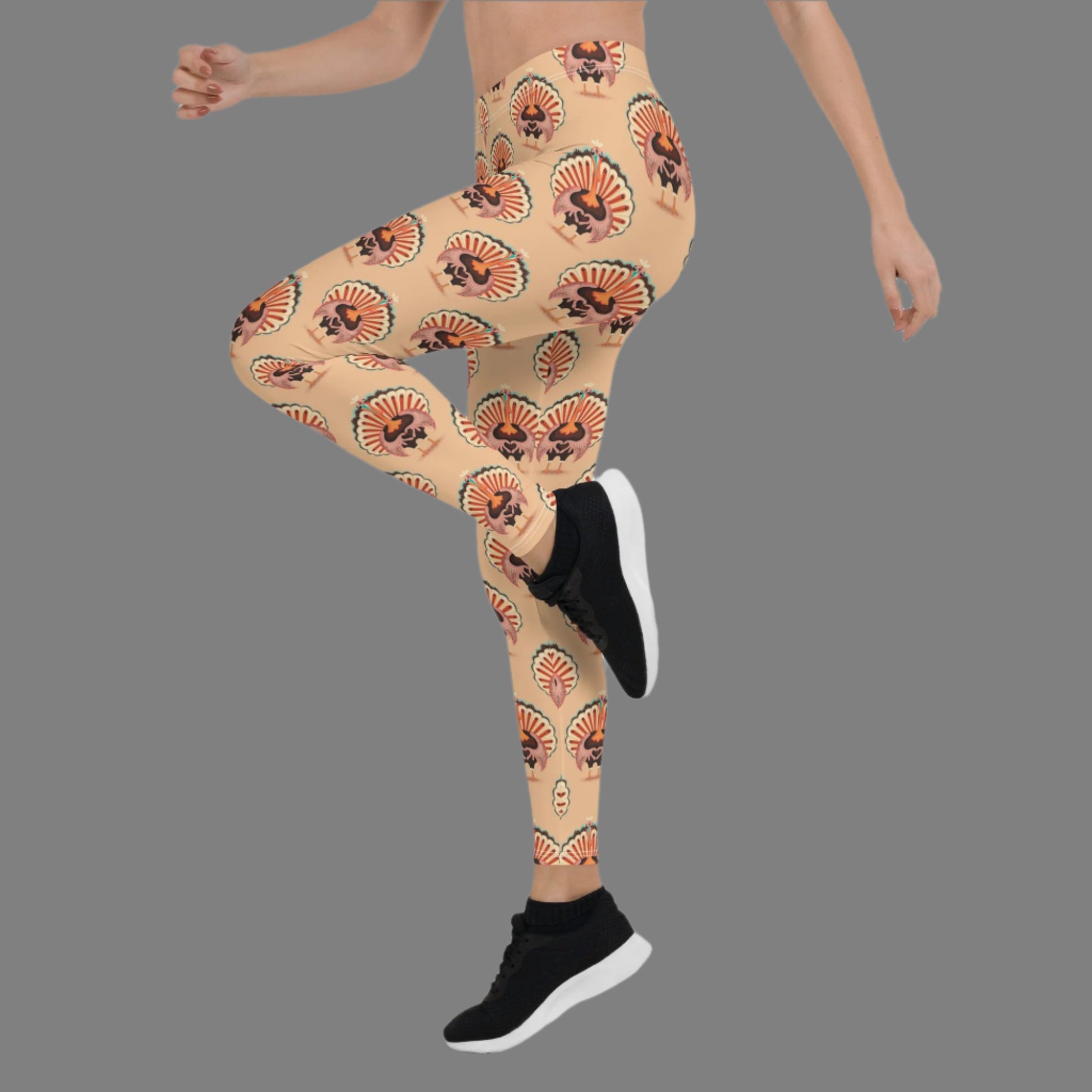 Thanksgiving Turkey Love ladies leggings. These womens yoga pants are peach, and have a repeating pattern of turkeys showing the love sign with their hands. These womens tights make a great gift, or a family matching outfit for the Turkey Trot! by jaecrece