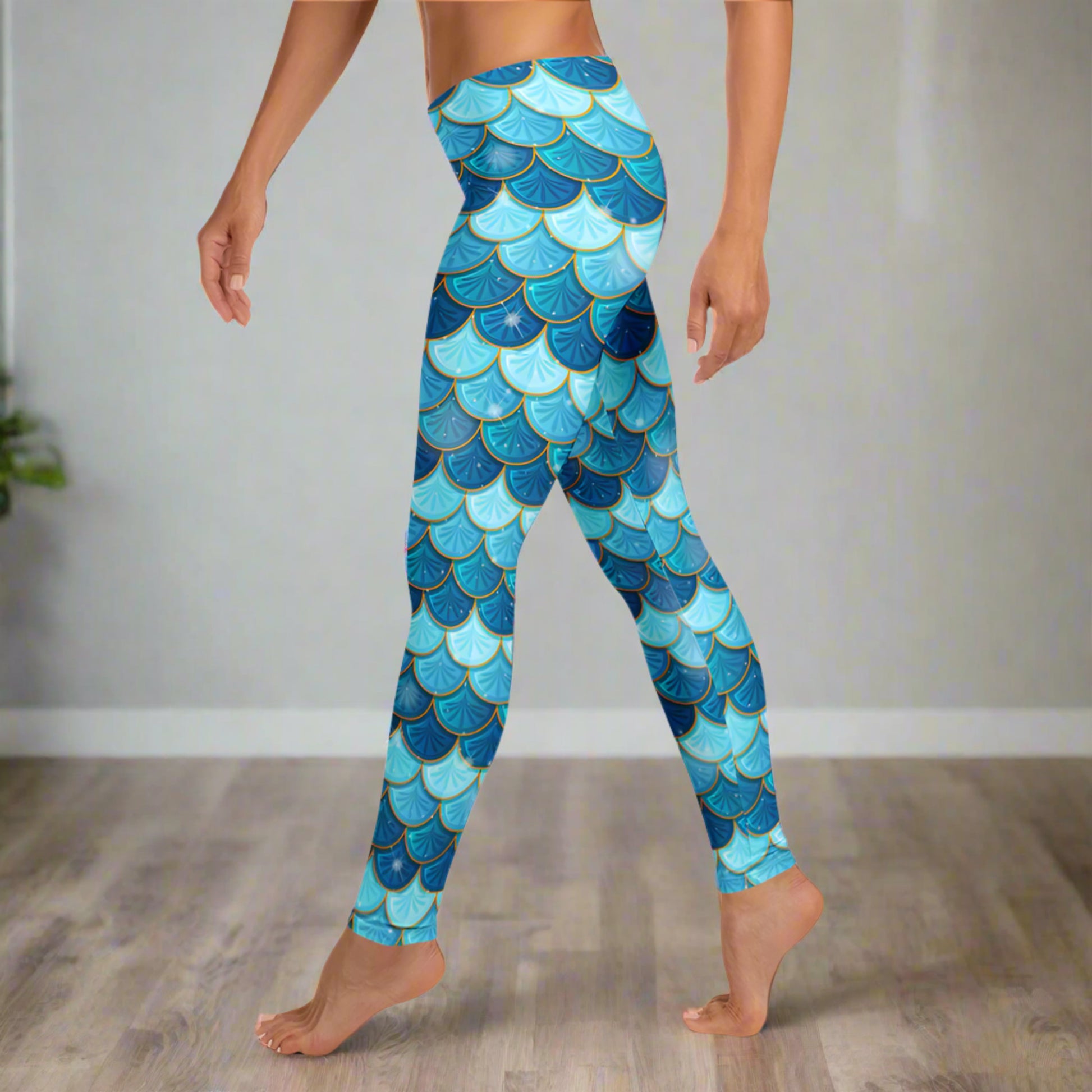 Image: Blue Mermaid Scales Leggings for Women. These mermaidcore aesthetic yoga pants have mermaid scales in shades of blue and teal with gold accents. Perfect for birthday parties, bachelorette parties, or Halloween mermaid costumes, by jaecrece