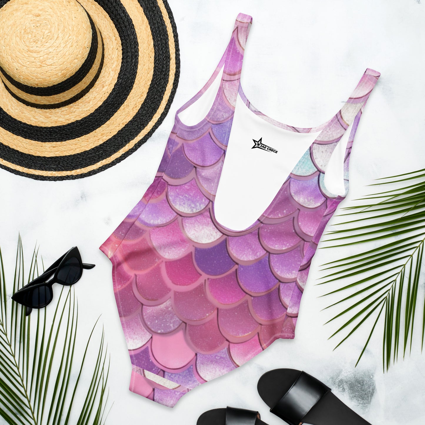 Image: Mermaid One Piece Swimsuit for Women, in shades of pink, purple and blue. This ladies mermaid scale swimming suit is part of a matching family swimwear collection, which includes a one piece, two piece, mens swim trunks, and swimsuits for toddler girls, tween girls and teen girls, by jaecrece