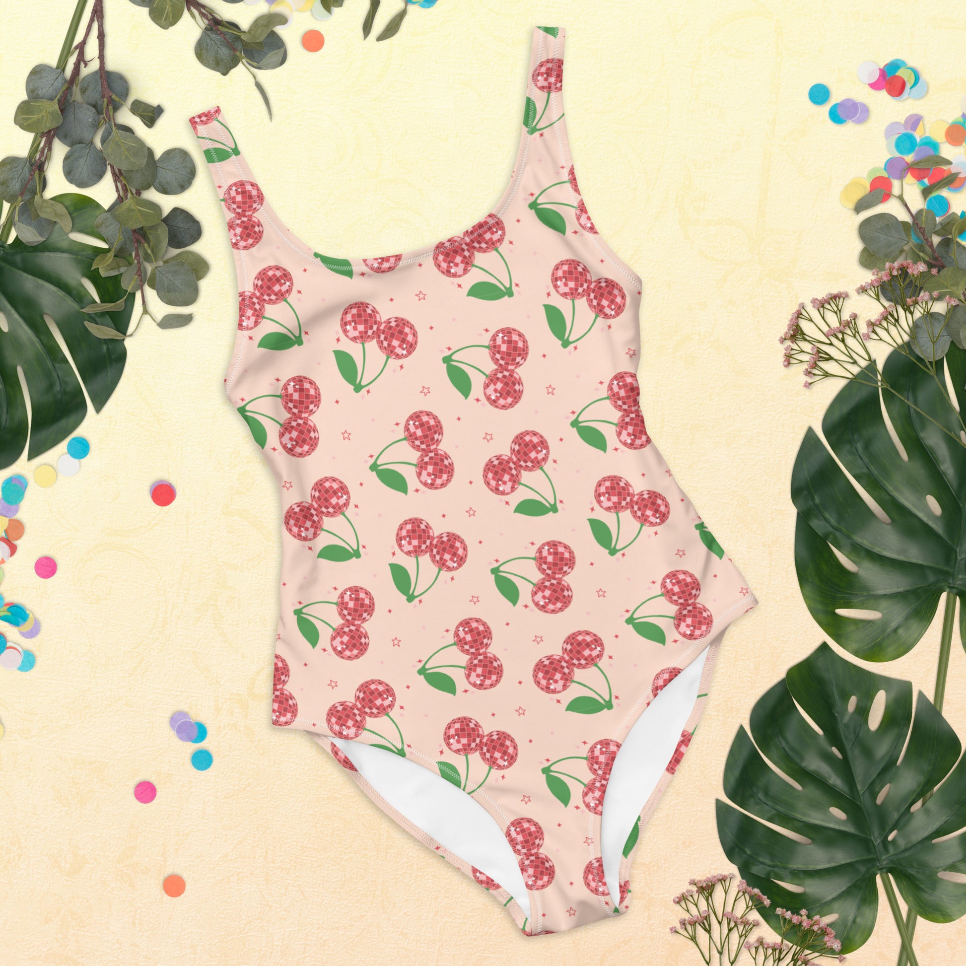 Image: Disco Cherries Women's One Piece Swimsuit, This fruit inspired swimsuit is a part of our Family Matching Swimwear Collection, and features a pink background with red disco ball cherries and stars, by jaecrece