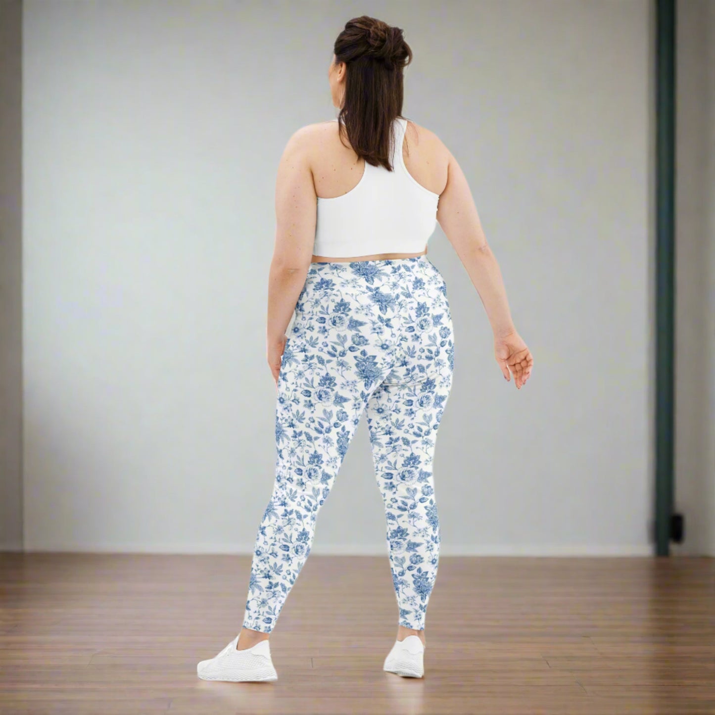Flattering and functional, these blue and white toile leggings in plus sizes 2XL–6XL are made for women who love comfort with a vintage twist. The four-way stretch fabric, high-rise waistband, and timeless floral design make them perfect for curvy girls on the move. A stylish pick for everyday wear or gifting, especially when paired with the matching toddler version.