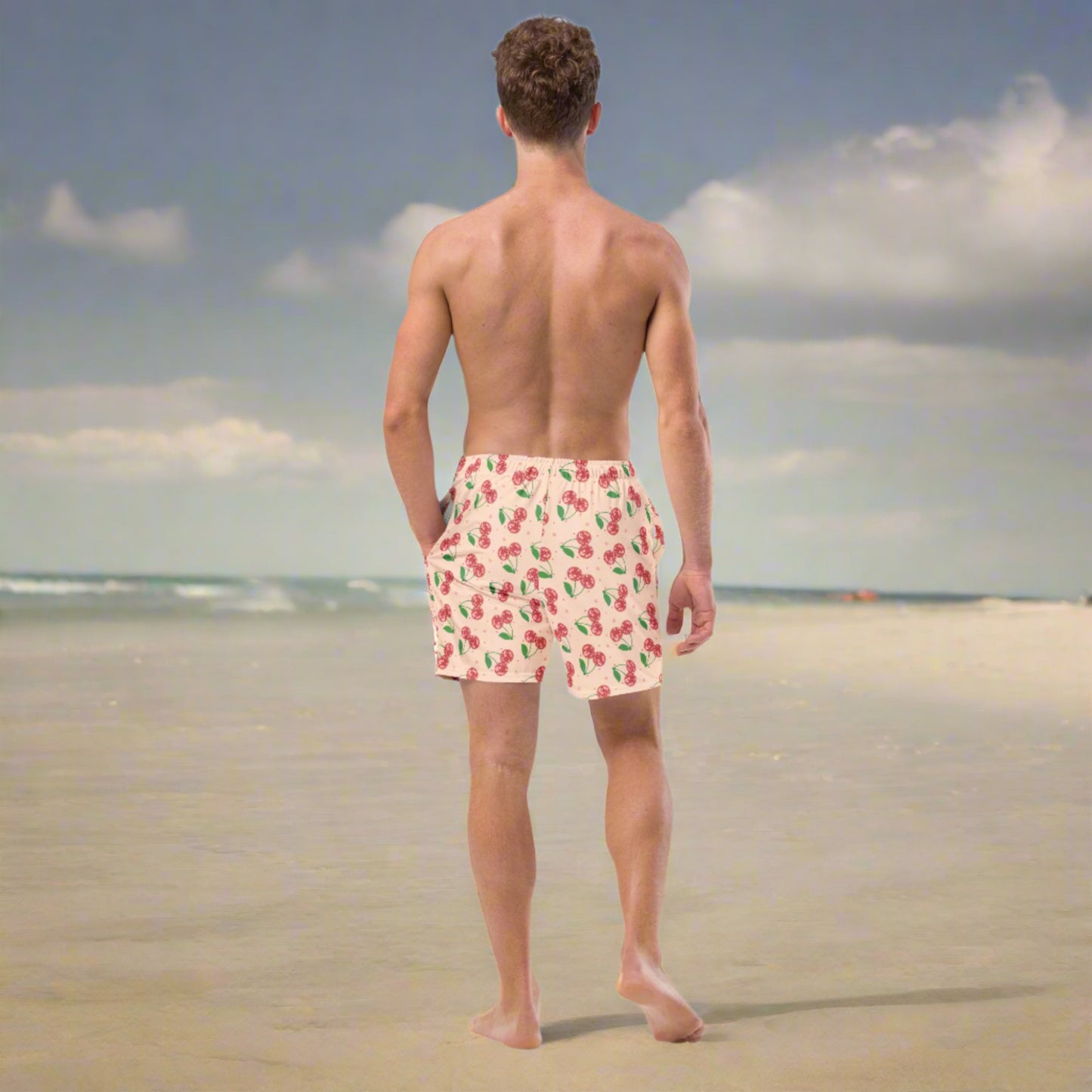 Image: Disco Cherries Mens Swim Trunks in sizes 2T-7, This fruit inspired swimsuit is a part of our Family Matching Swimwear Collection, and features a pink background with red disco ball cherries and stars, by jaecrece