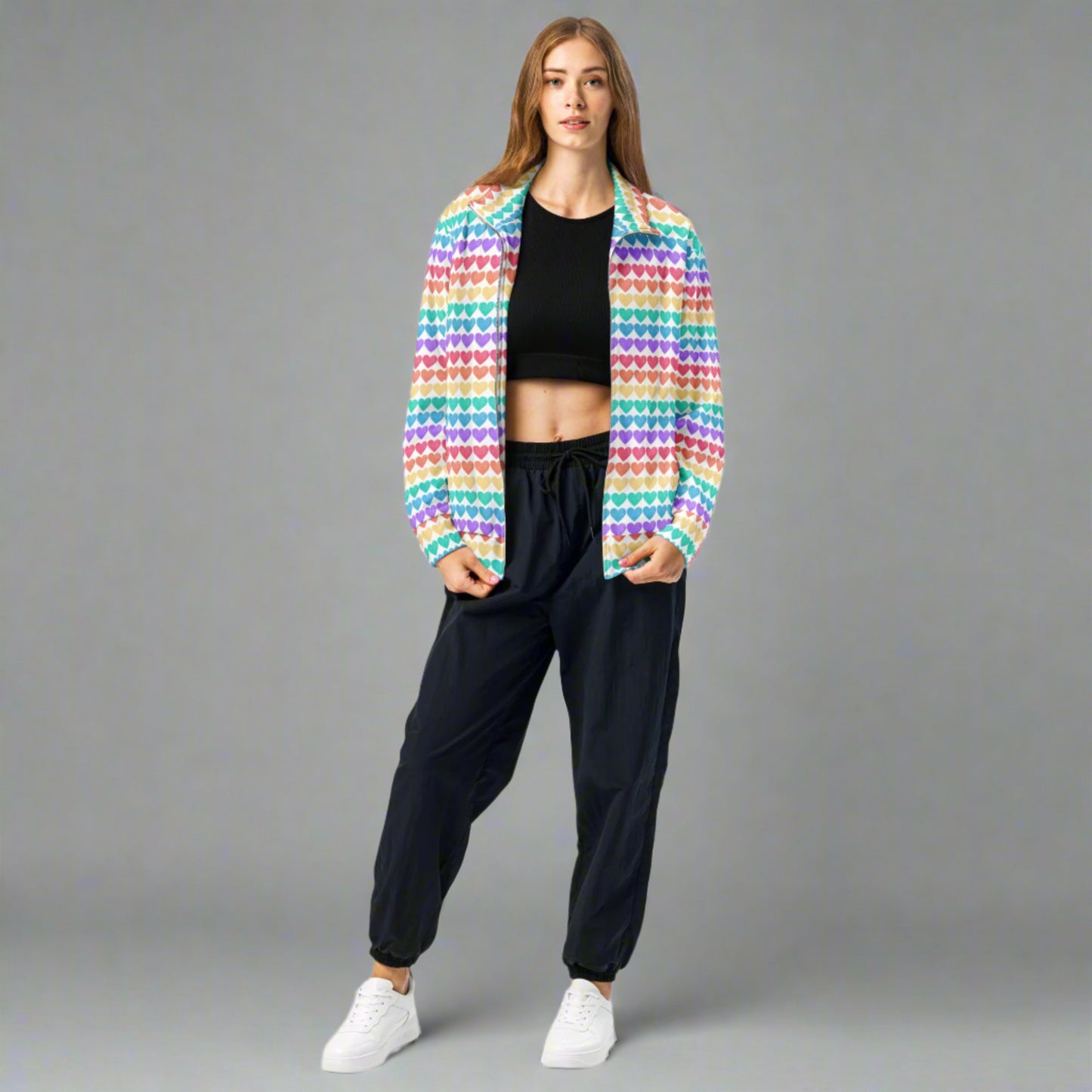 Stay cozy and colorful in this Rainbow Heart Track Jacket with a white base and rows of rainbow hearts. The inclusive sizing from 2XS to 6XL ensures a great fit for all. Designed to pair with matching leggings or wear solo as a statement piece, this jacket is perfect for parades, festivals, or bright streetwear style.