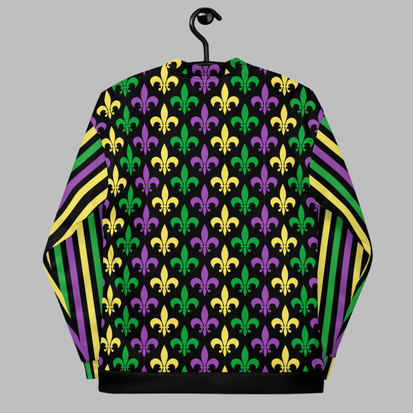 Image: Mardi Gras Unisex Bomber Jacket. This lightweight NOLA apparel is perfect for parades in the French Quarter, or Mardi Gras themed fun runs. It features a gold, green and purple fleur de lis pattern on the front and back, with gold, purple and green stripes going down each arm. Plus sizes available, by jaecrece