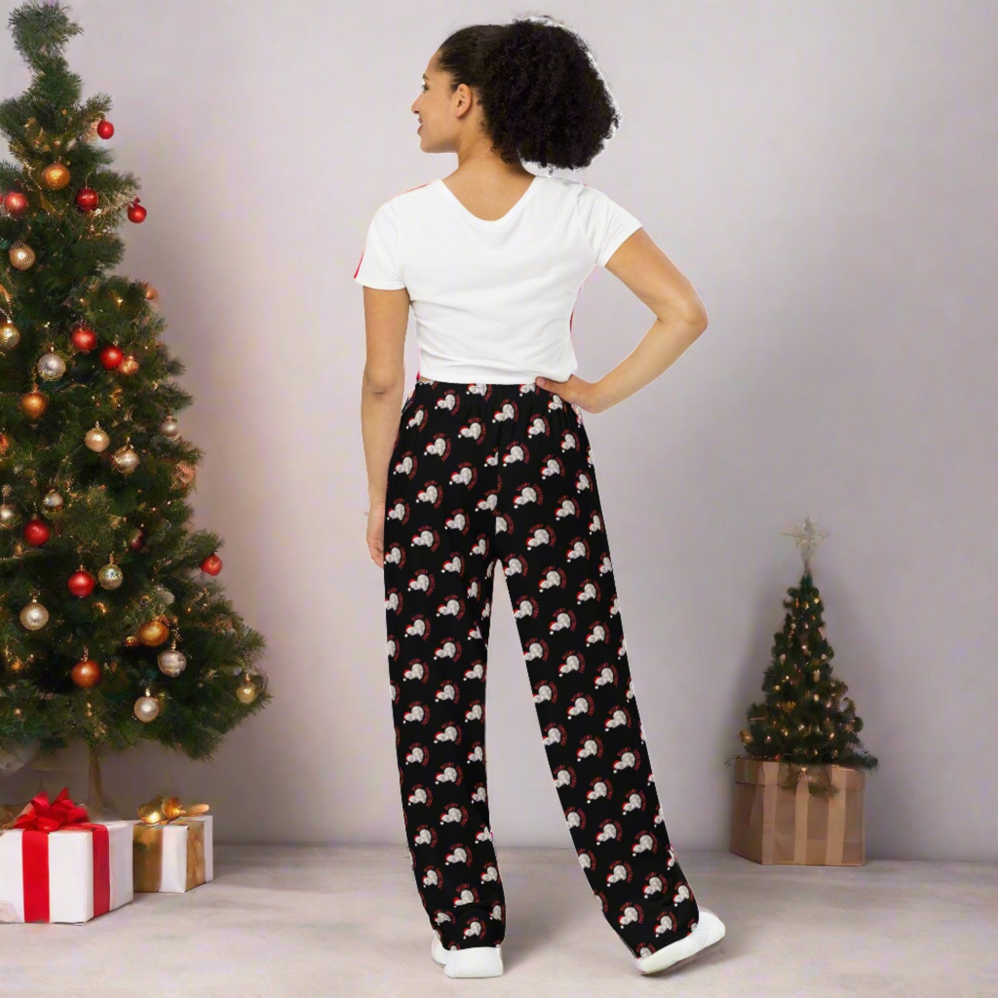 Slip into festive comfort with these adult Meowy Christmas wide leg pants, featuring a black background and cheerful cat holiday print. Sized inclusively from 2XS–6XL, they’re ideal for seasonal lounging or coordinating with our family matching collection. Whether you're posing for Christmas cards or sipping cocoa by the fire, these pants keep the holiday spirit cozy and cute.