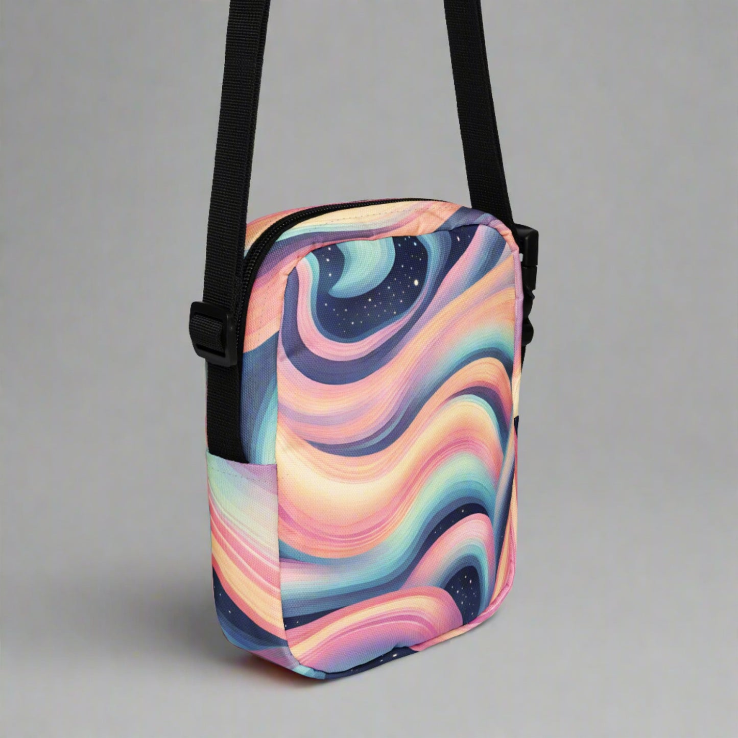 Celestial Canvas Utility Crossbody Bag, featuring pastel shades of pink and blue swirling around midnight stars, by jaecrece.com