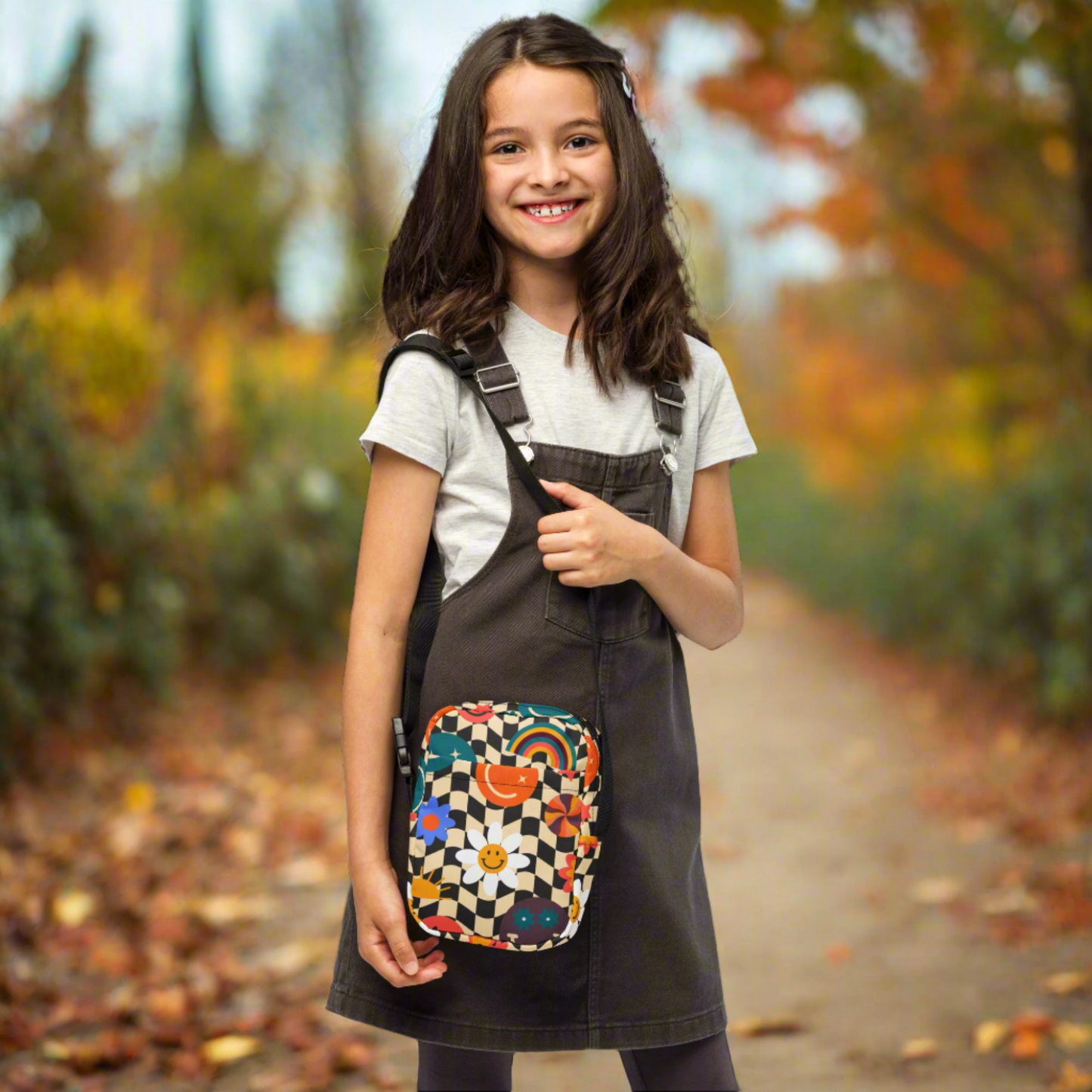 Image: This fun and functional small canvas tote bag features a classic checkerboard pattern and cute smiley face, making it a standout piece for tweens and teens. Whether used as a fanny pack alternative or a compact camera bag, this crossbody is lightweight, durable, and full of personality. Great for birthdays, summer break, or back to school season, it is a trendy and cheerful everyday accessory, by jaecrece.