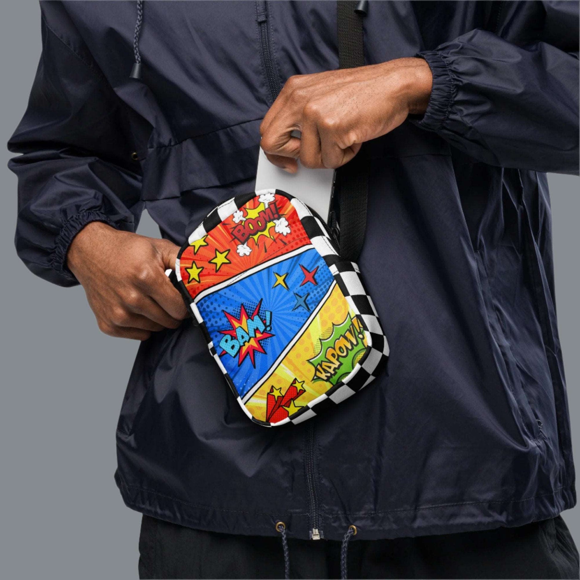 Comic Book Crossbody Bag, Comic Con Convention Small Tote, Cosplay Fanny Pack, Music Festival Sling Pouch, Waist Hip Pouch Boy Gift. This small canvas camera bag features comic book graphics in red, blue and yellow, with the words Boom Bam Kapow.