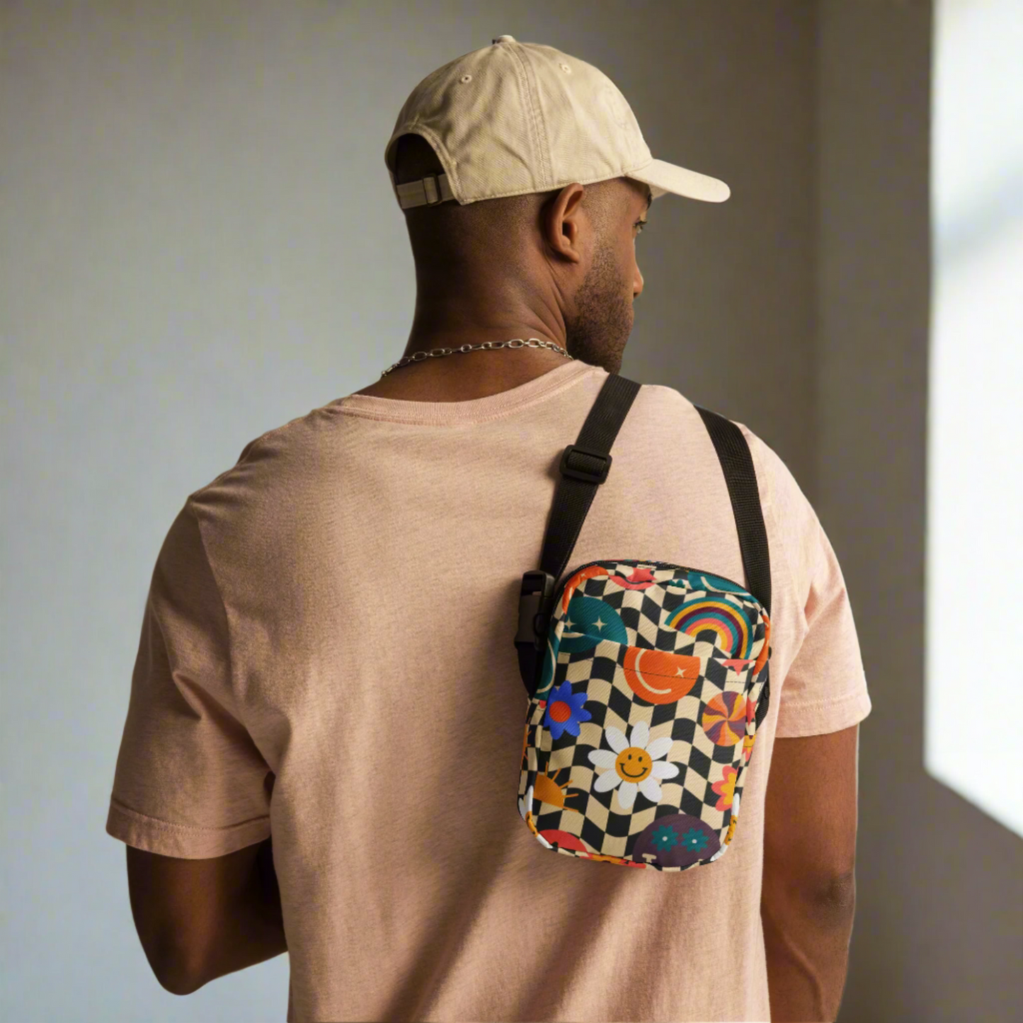 Image: Small but bold, this checkered crossbody bag is made with soft canvas fabric and features a rainbow smiley face for a playful and vintage look. Ideal for tweens and teens, this canvas tote can be worn as a sling, fanny pack, or shoulder purse. A trendy piece for summer festivals, travel, or daily errands, it is the ultimate small purse for girls who love colorful and unique accessories, by jaecrece.