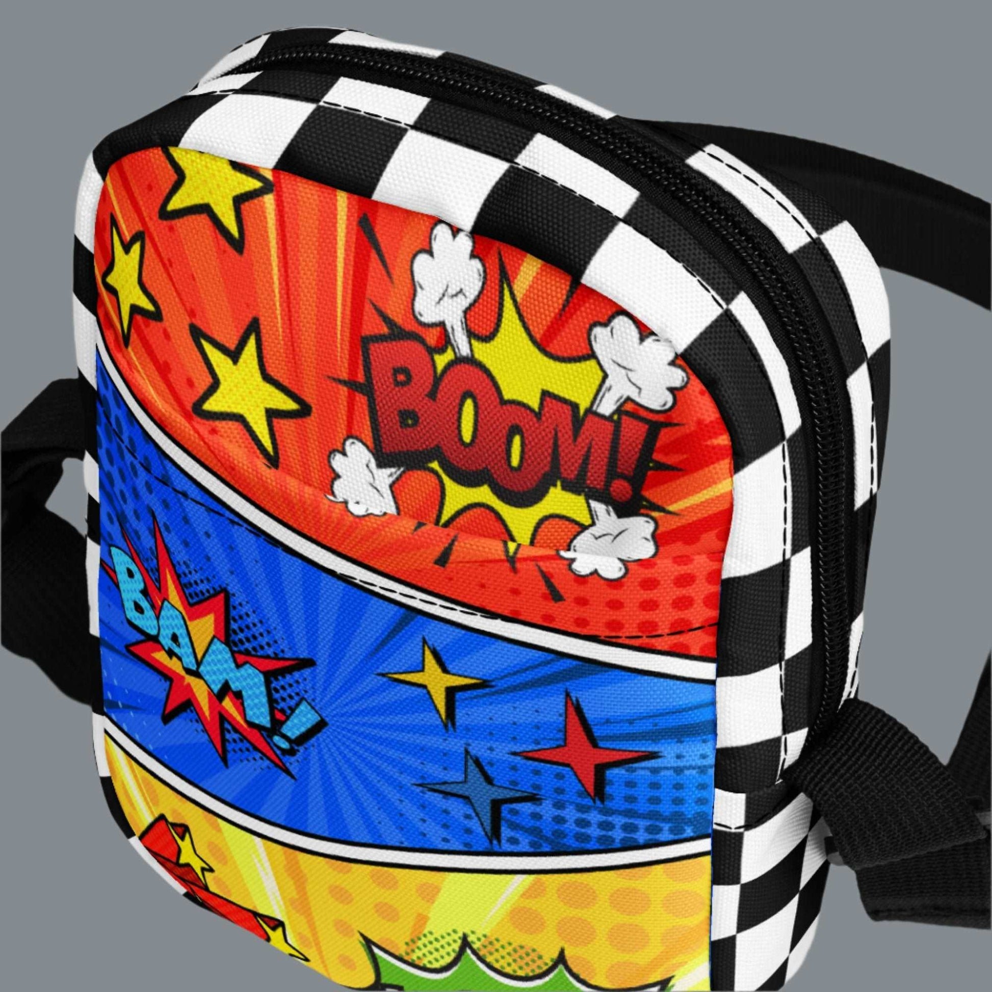 Comic Book Crossbody Bag, Comic Con Convention Small Tote, Cosplay Fanny Pack, Music Festival Sling Pouch, Waist Hip Pouch Boy Gift. This small canvas camera bag features comic book graphics in red, blue and yellow, with the words Boom Bam Kapow.