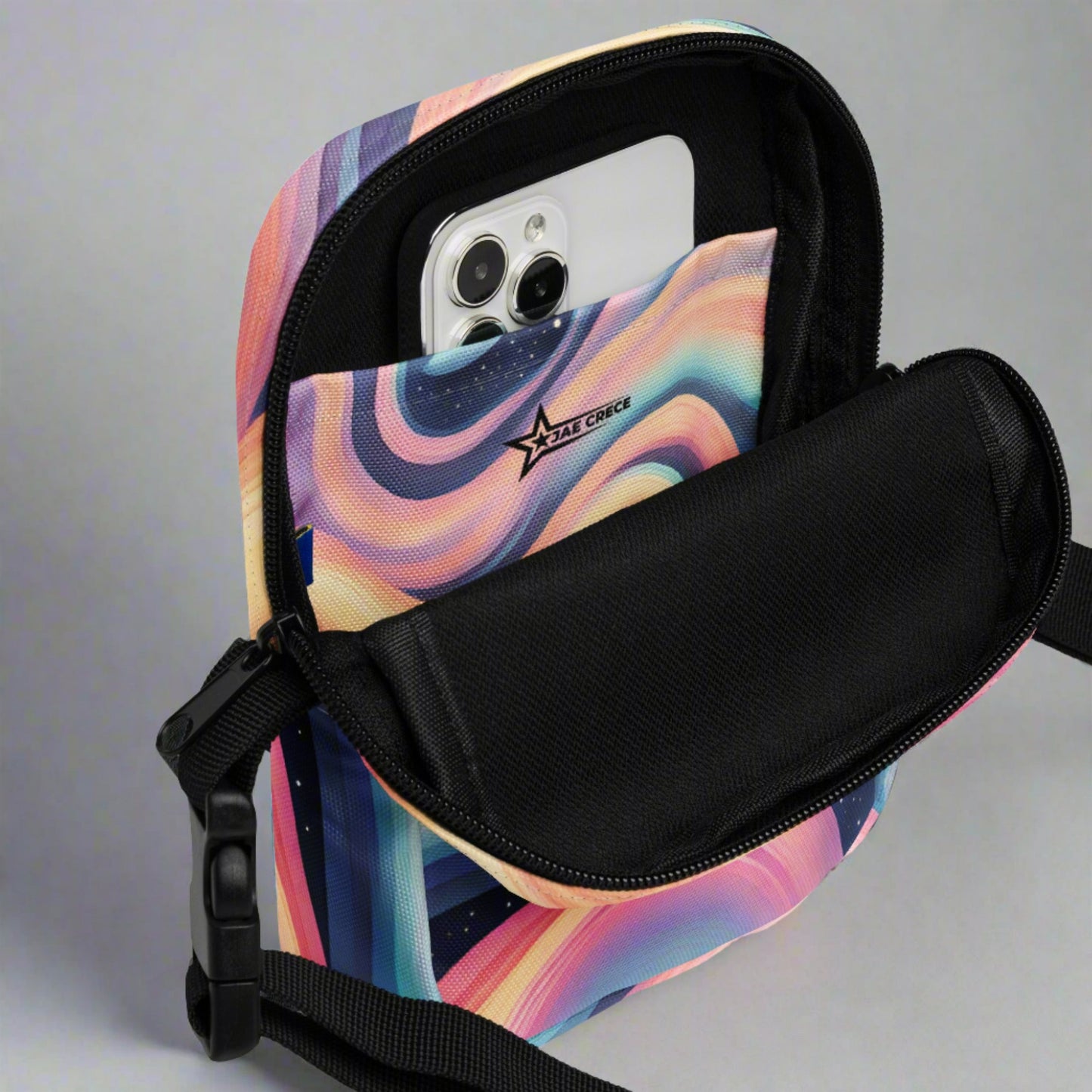 Celestial Canvas Utility Crossbody Bag, featuring pastel shades of pink and blue swirling around midnight stars, by jaecrece.com