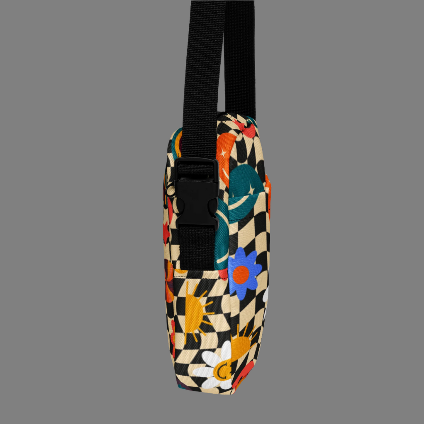 Image: Bring on the smiles with this adorable checkerboard crossbody featuring a retro rainbow happy face. The durable canvas makes it a practical and fashionable pick for tweens, teens, or moms on the go. Great for storing phones, lip gloss, or small cameras, it transitions easily from a daily tote to a statement travel bag. A sweet and unique gift option for girls of all ages, by jaecrece.