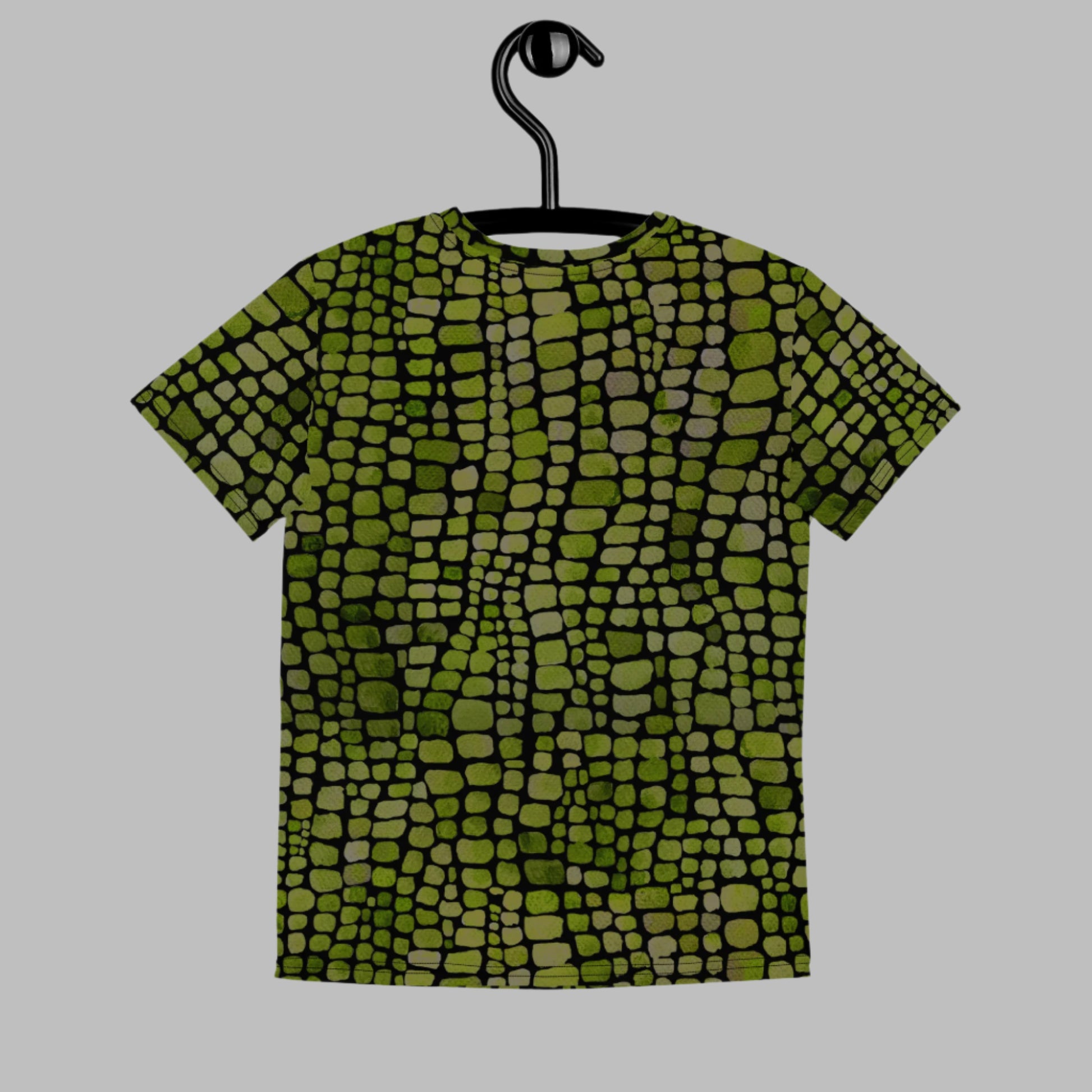 Green reptile youth t-shirt for boys and girls, with all-over scales in sizes 8–20. A perfect base for snake, lizard, or dinosaur costumes, this tee is also great for jungle playdates, zoo visits, or imaginative fashion. Lightweight and breathable, it's an everyday shirt that’s bold, fun, and full of wild energy. A favorite for tweens who love animal prints and exploring the great outdoors.