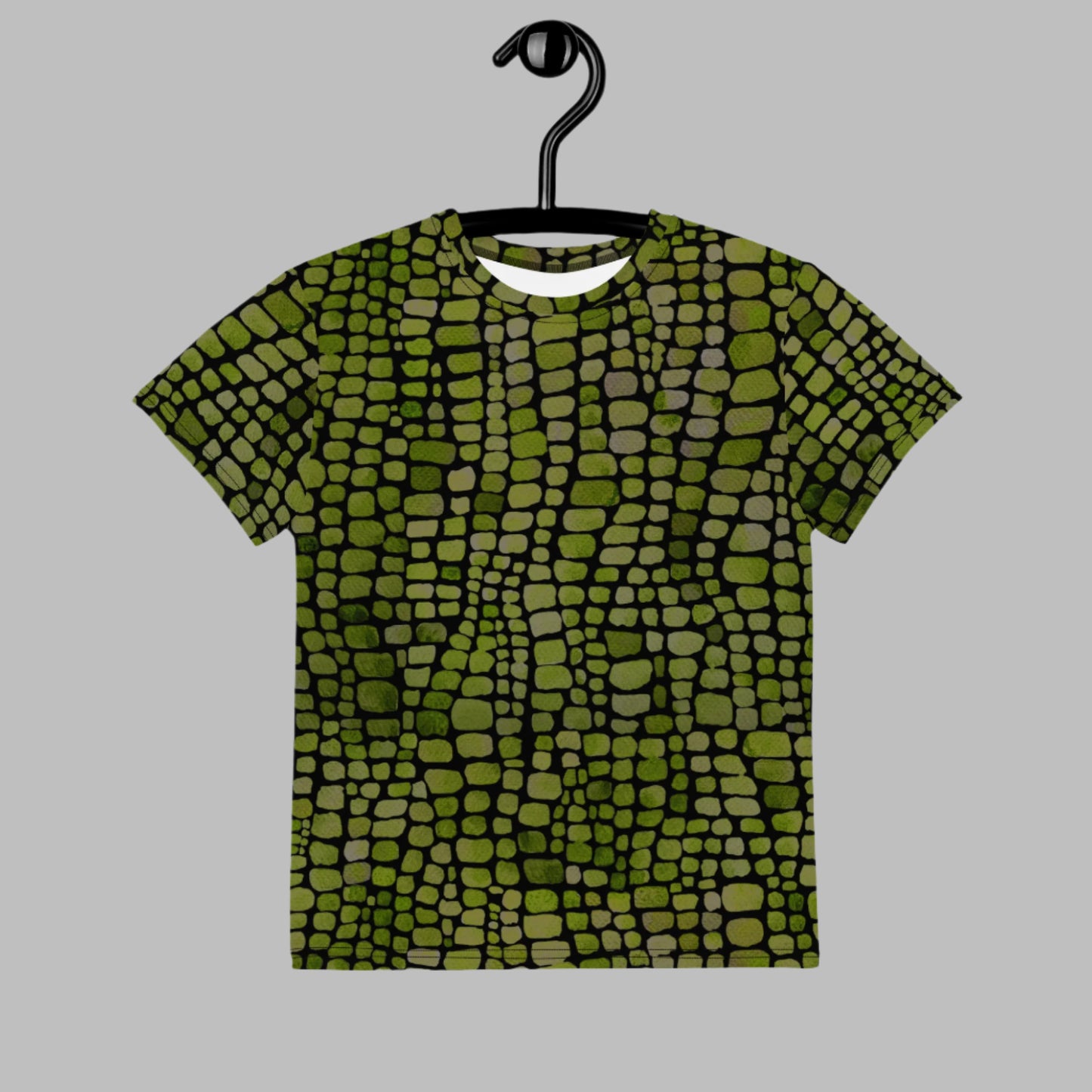 Reptile-themed youth t-shirt with green scale design in sizes 8–20, ideal for snake, lizard, or dinosaur fans. This unisex tee is made for comfort and creativity, doubling as a casual shirt or a costume top. Whether heading to the zoo, attending a themed birthday, or just showing off wild style, this top keeps kids cool and confident. Pairs well with other family sizes for fun group outfits.