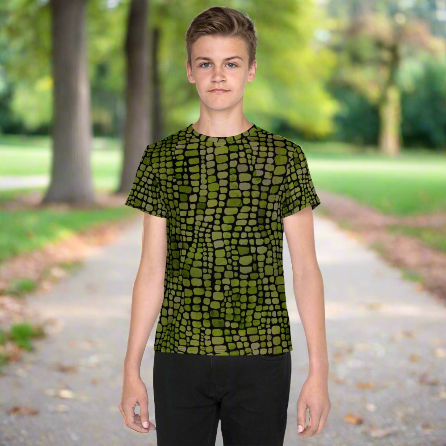 All-over green reptile print t-shirt for tweens, sized 8–20, perfect for creature costumes or everyday adventure looks. This youth tee is great for boys or girls who love snakes, lizards, or dinosaurs. Ideal for costume parties, jungle themes, and school fun. Soft and lightweight, this bold shirt adds excitement to wardrobes and sparks creativity in kids who love animals and nature.