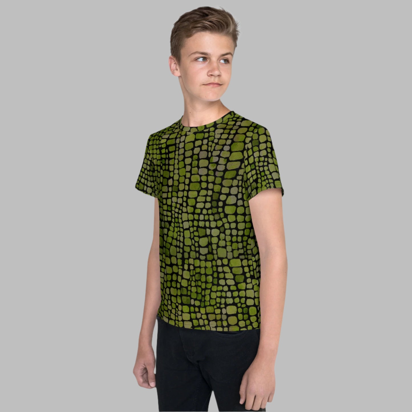 Tween t-shirt with bold green reptile pattern, perfect for dinosaur, snake, or lizard fans. Available in youth sizes 8–20, this all-over print shirt brings costume-ready energy to any outfit. Great for jungle themes, nature play, or simply standing out, it’s a comfortable, unisex tee for boys and girls who love animal-inspired fashion. Soft fabric and strong color make it a summer wardrobe essential.