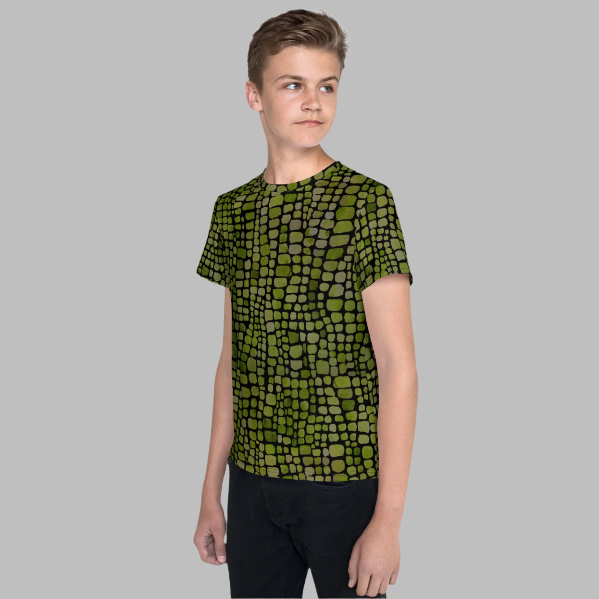 Tween t-shirt with bold green reptile pattern, perfect for dinosaur, snake, or lizard fans. Available in youth sizes 8–20, this all-over print shirt brings costume-ready energy to any outfit. Great for jungle themes, nature play, or simply standing out, it’s a comfortable, unisex tee for boys and girls who love animal-inspired fashion. Soft fabric and strong color make it a summer wardrobe essential.