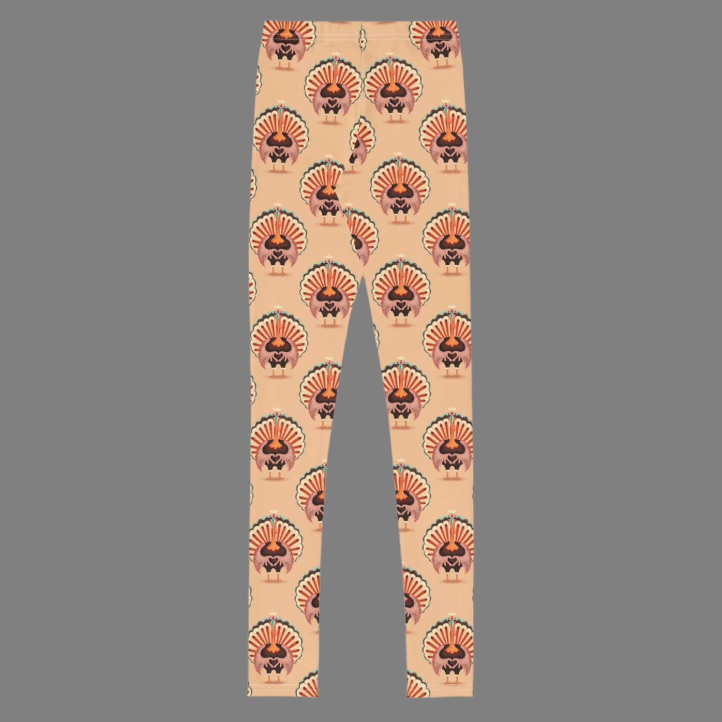 Thanksgiving Turkey Love child leggings. These girls yoga pants are peach, and have a repeating pattern of turkeys showing the love sign with their hands. These girls child tights make a great gift, or a family matching outfit for the Turkey Trot! by jaecrece