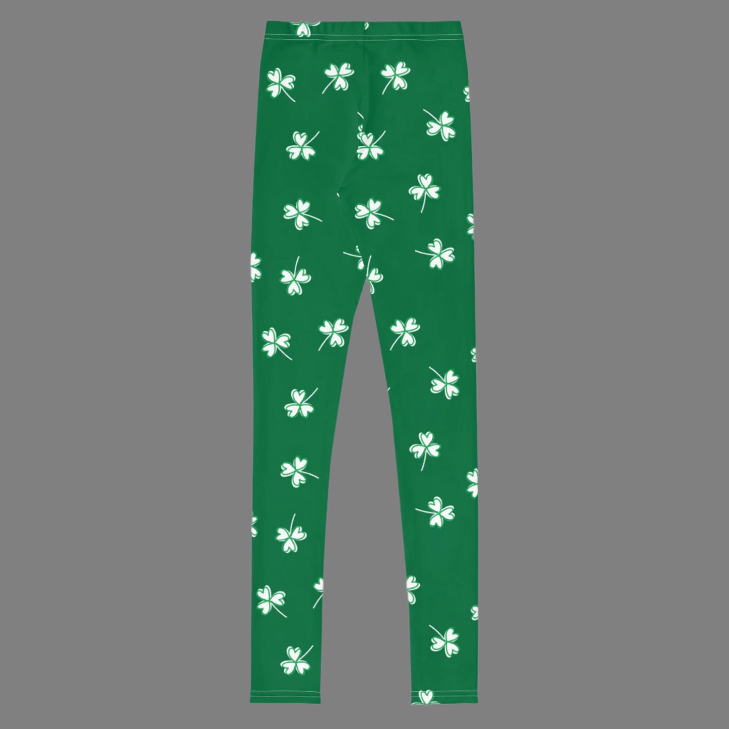 Image: Family Matching St Patricks Day Shamrock Leggings. Festive yoga pants with green background and white four leaf clovers. Available in sizes for toddler girls, teens, tweens, and women. Perfect for a St Pattys Day parade or fun run, by jaecrece