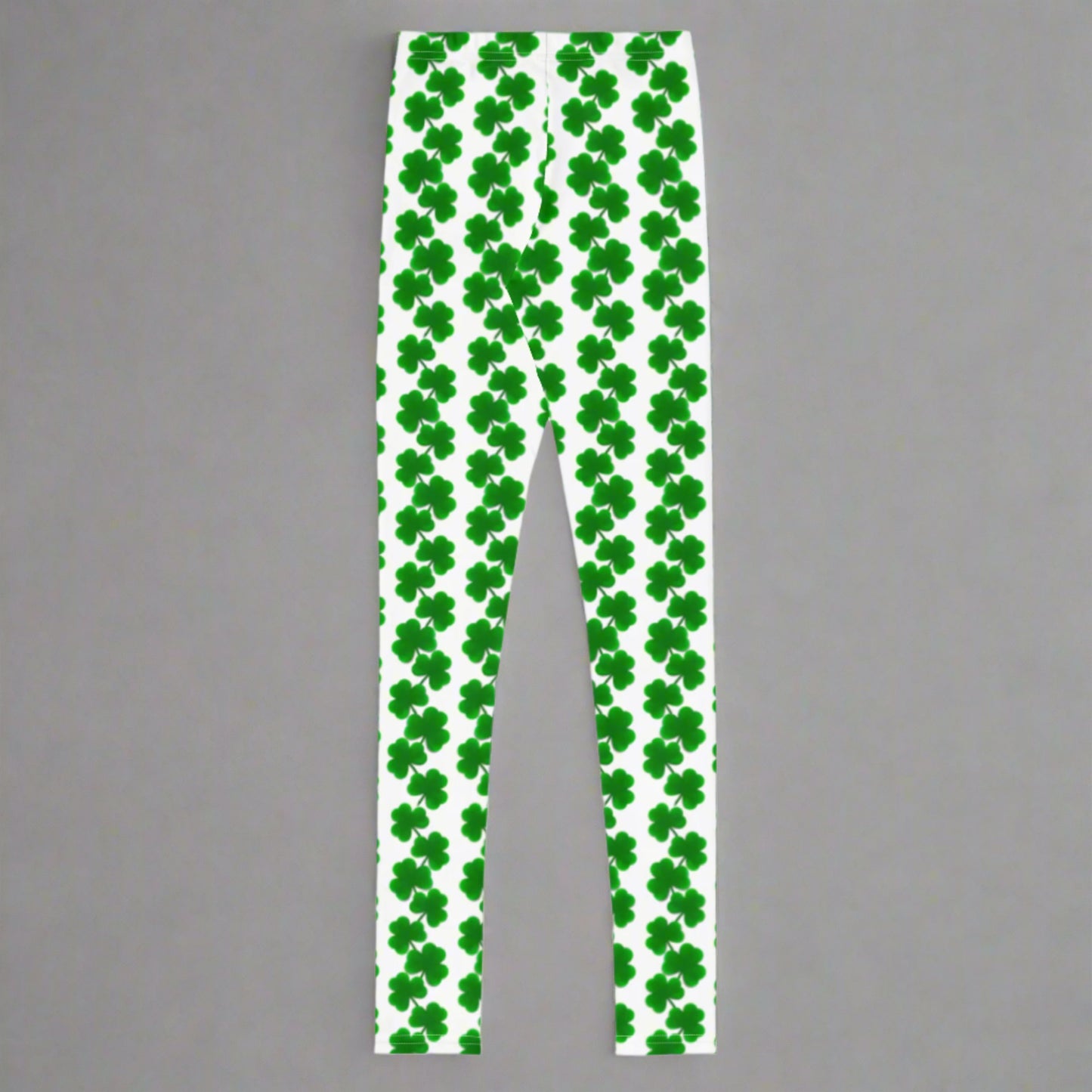 Image: St Patricks Day Shamrock Leggings in Tween and Teen Girls Sizes 8, 10, 12, 14, 16, 18, 20. These white yoga pants feature rows of four leaf clovers in a pattern down each leg, by jaecrece