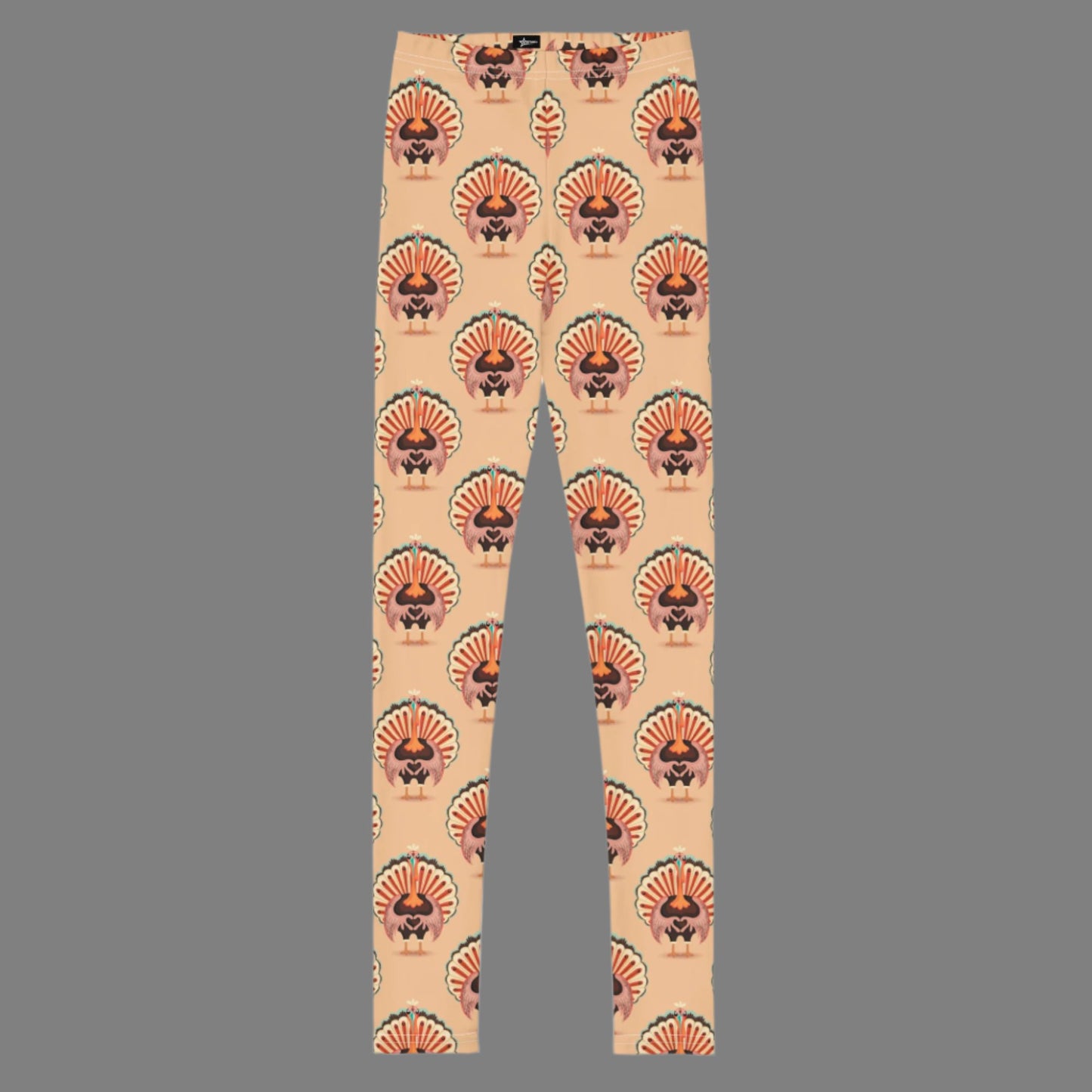 Thanksgiving Turkey Love child leggings. These girls yoga pants are peach, and have a repeating pattern of turkeys showing the love sign with their hands. These girls child tights make a great gift, or a family matching outfit for the Turkey Trot! by jaecrece
