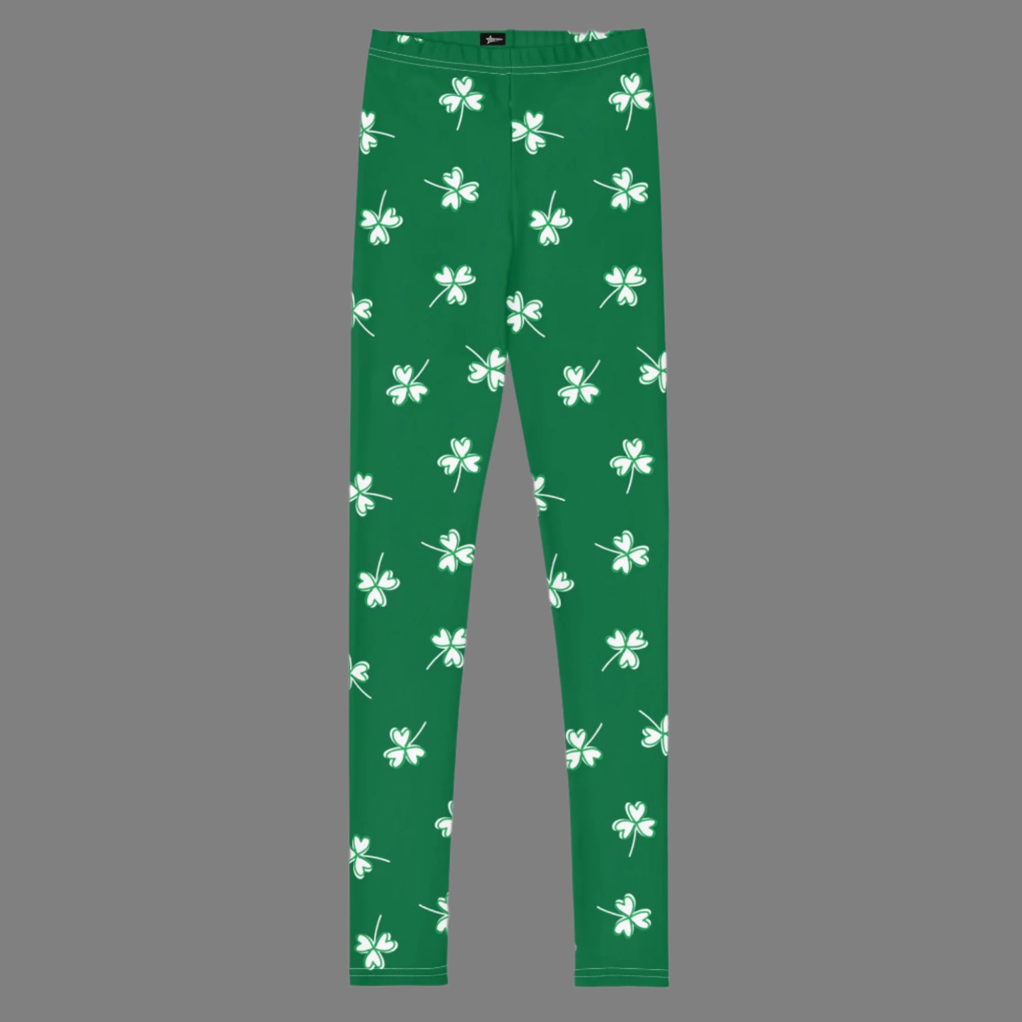 Image: Family Matching St Patricks Day Shamrock Leggings. Festive yoga pants with green background and white four leaf clovers. Available in sizes for toddler girls, teens, tweens, and women. Perfect for a St Pattys Day parade or fun run, by jaecrece