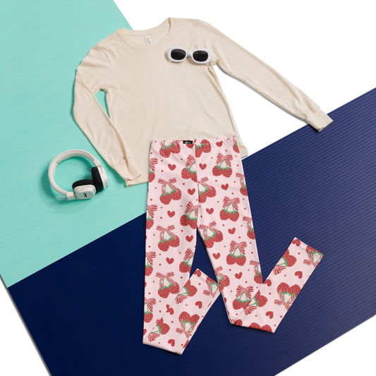 Image: These adorable leggings for girls, tweens, and teens feature a pastel pink background with playful red striped bows and bright strawberries. Perfect for fashion-forward kids and young trendsetters, they blend comfort with a bold coquette vibe. Great for school, weekend hangouts, or dance practice, they add a fun pop of personality to any outfit and make a sweet gift idea, by jaecrece.