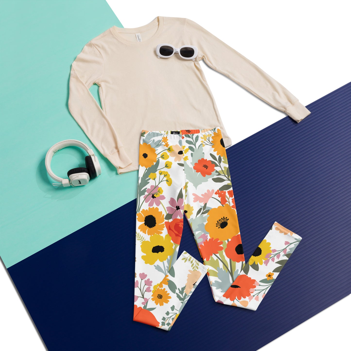 Image: Girls and teens will love these bright floral youth leggings with a watercolor wildflower design in cheerful spring colors. Offered in sizes 8–20, they are perfect for school outfits, nature events, or family outings. Soft and stretchy with a lightweight feel, these leggings are part of a matching family collection so siblings and mom can match too. A lovely option for spring holidays, garden parties, or flower-themed birthdays, by jaecrece.