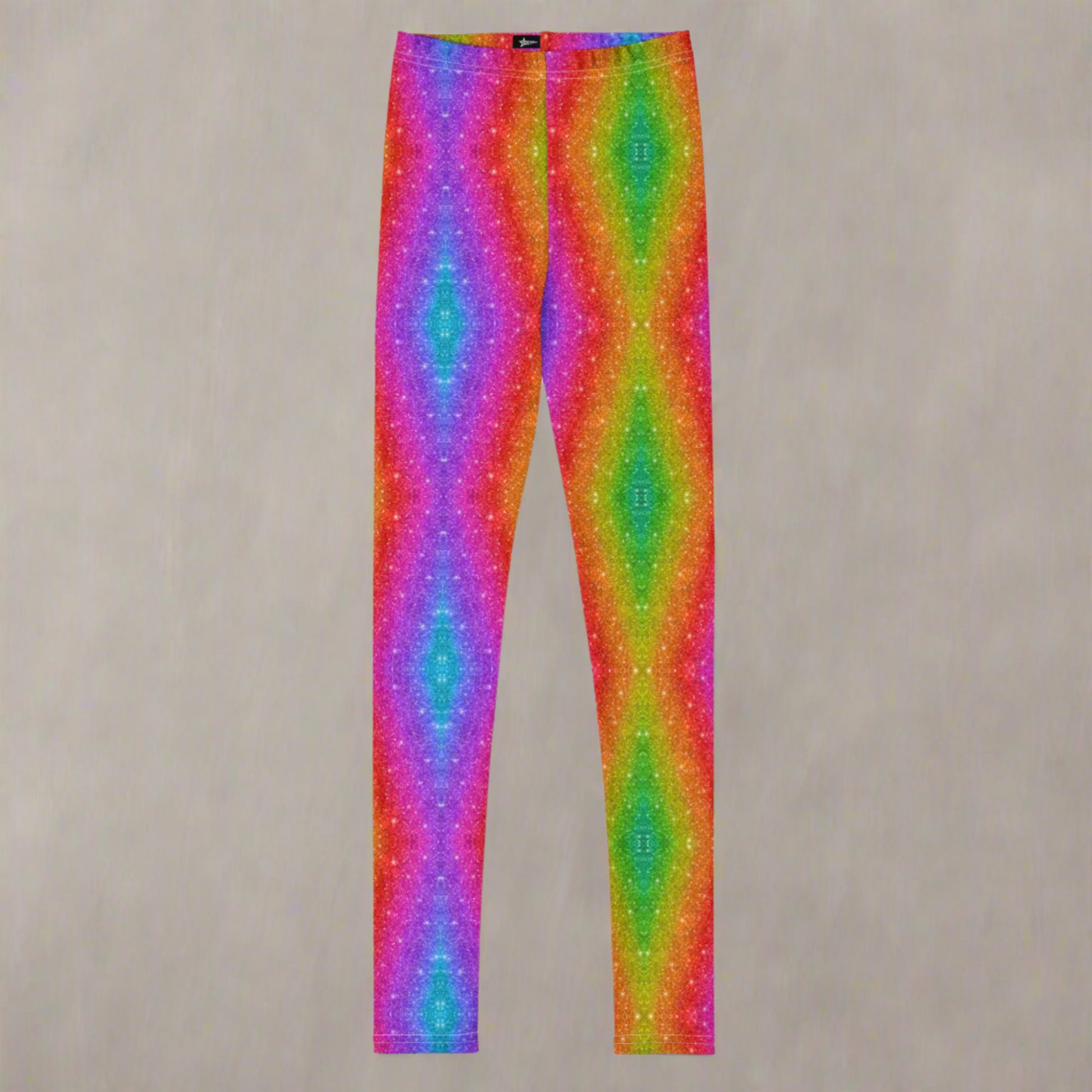 Tween rainbow swirl leggings with a glitter effect print, ideal for sizes 8–20. Perfect for Pride celebrations, Mardi Gras parades, festivals, or running events. These leggings are made from durable microfiber with four-way stretch, giving girls comfort, movement, and vibrant color all in one. Match with toddler and women’s sizes for family sets!