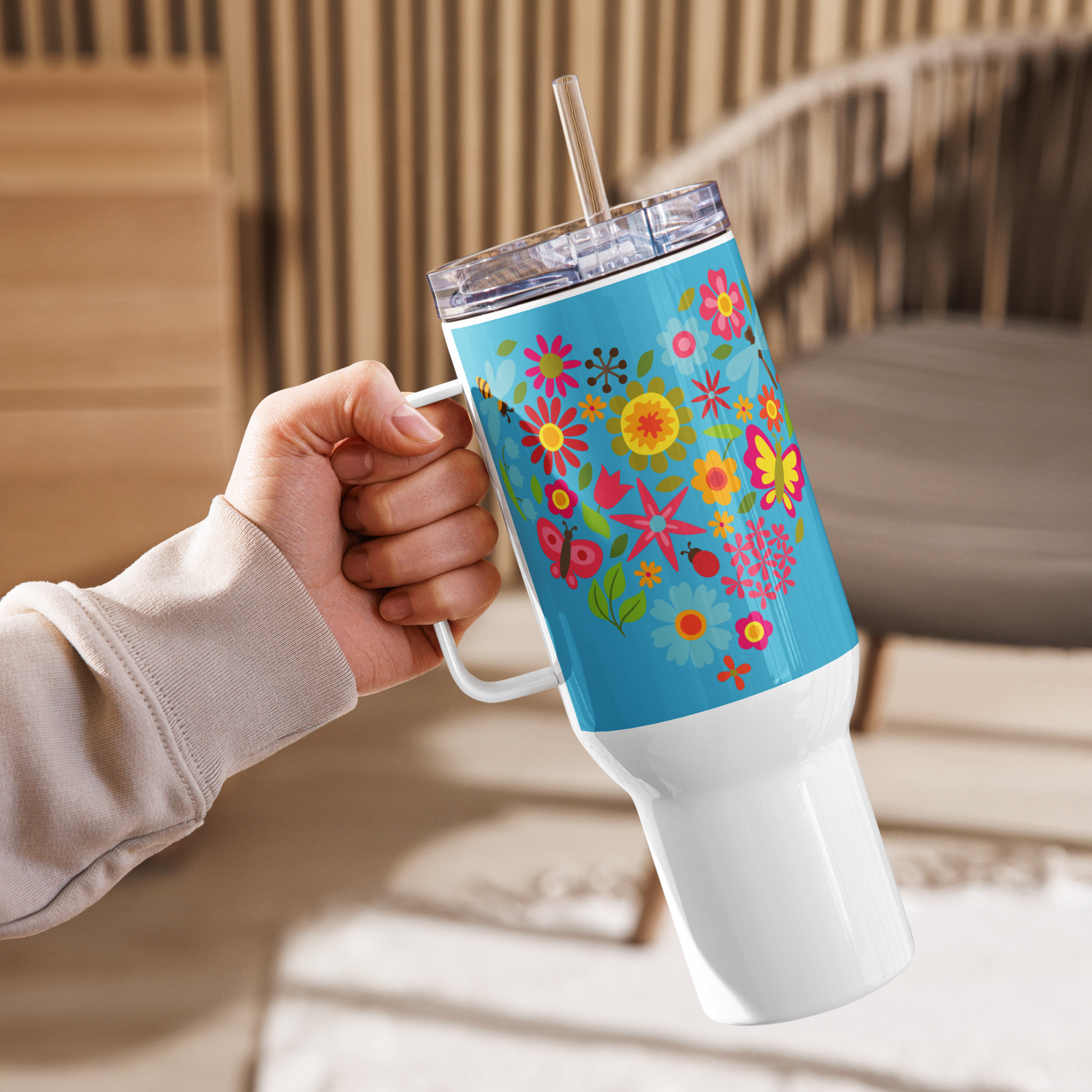 Image: A sunflower and butterfly inspired 40oz tumbler, perfect for those who love bright, cheerful designs. This floral travel cup includes a handle, straw, and lid, keeping drinks hot or cold for long hours. Whether used for morning coffee, iced tea, or smoothies, it’s a stylish and practical choice. An excellent birthday, Mother's Day, or just-because gift for nature lovers, by jaecrece.
