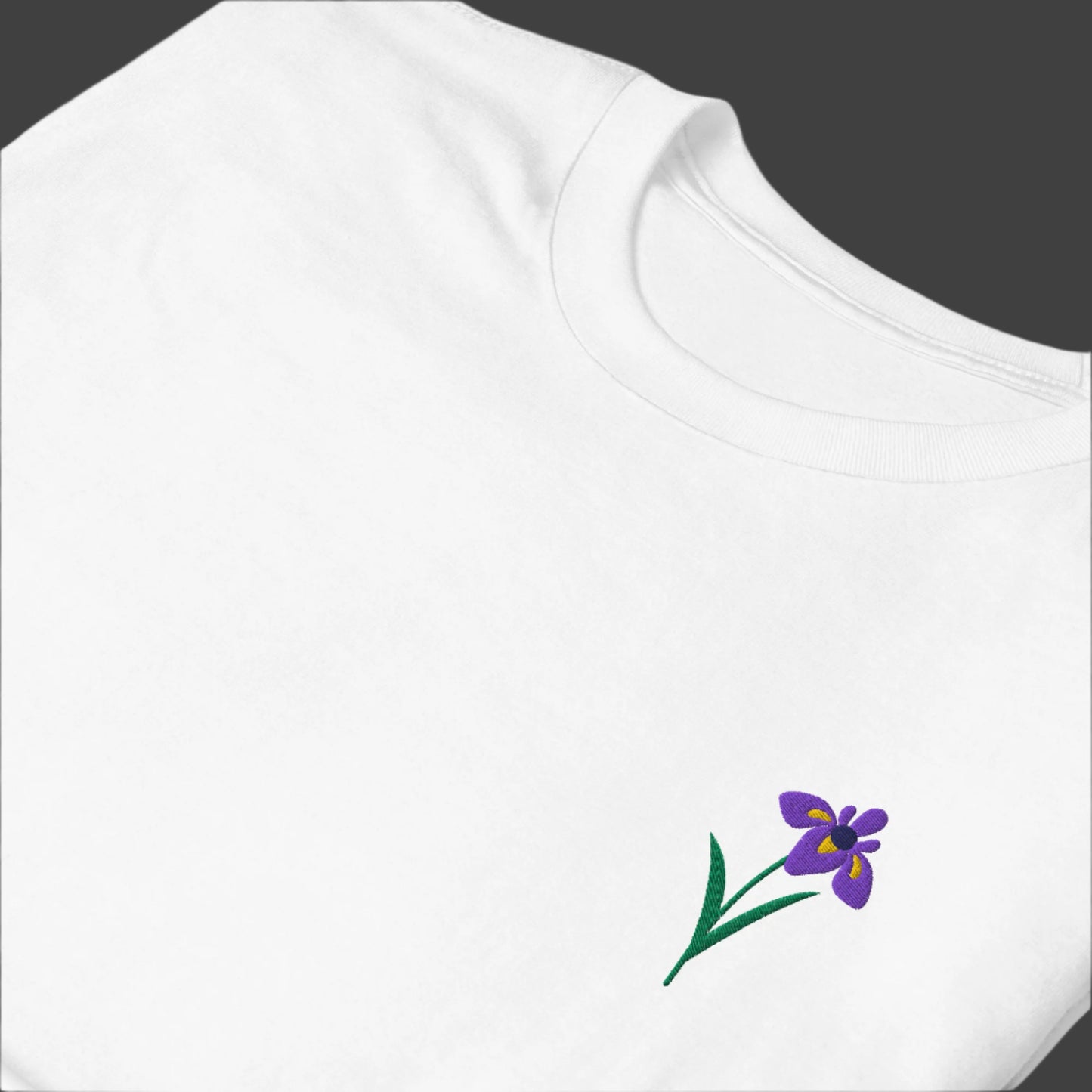 Image: A delicate embroidered iris crewneck sweatshirt, perfect for spring and beyond. This floral-themed pullover features a timeless flower embroidery design, making it a perfect birthday, holiday, or Mother’s Day gift. Whether styled casually or layered for a chic look, this sweater is a must-have for those who love feminine florals and elegant nature-inspired fashion, by jaecrece.