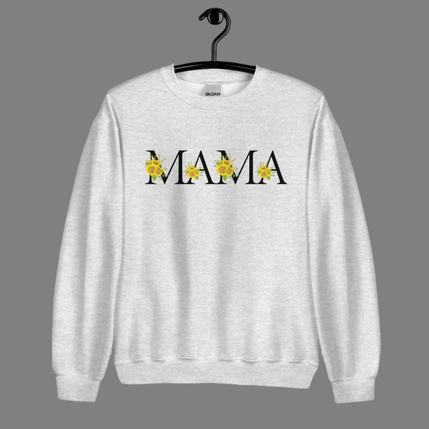 Image: MAMA sunflower tshirt, available in white, light pink and ash. This pullover crewneck features the word MAMA in large black block letters with sunflower calligraph accent. A great baby announcement gift or Mothers day present by jaecrece