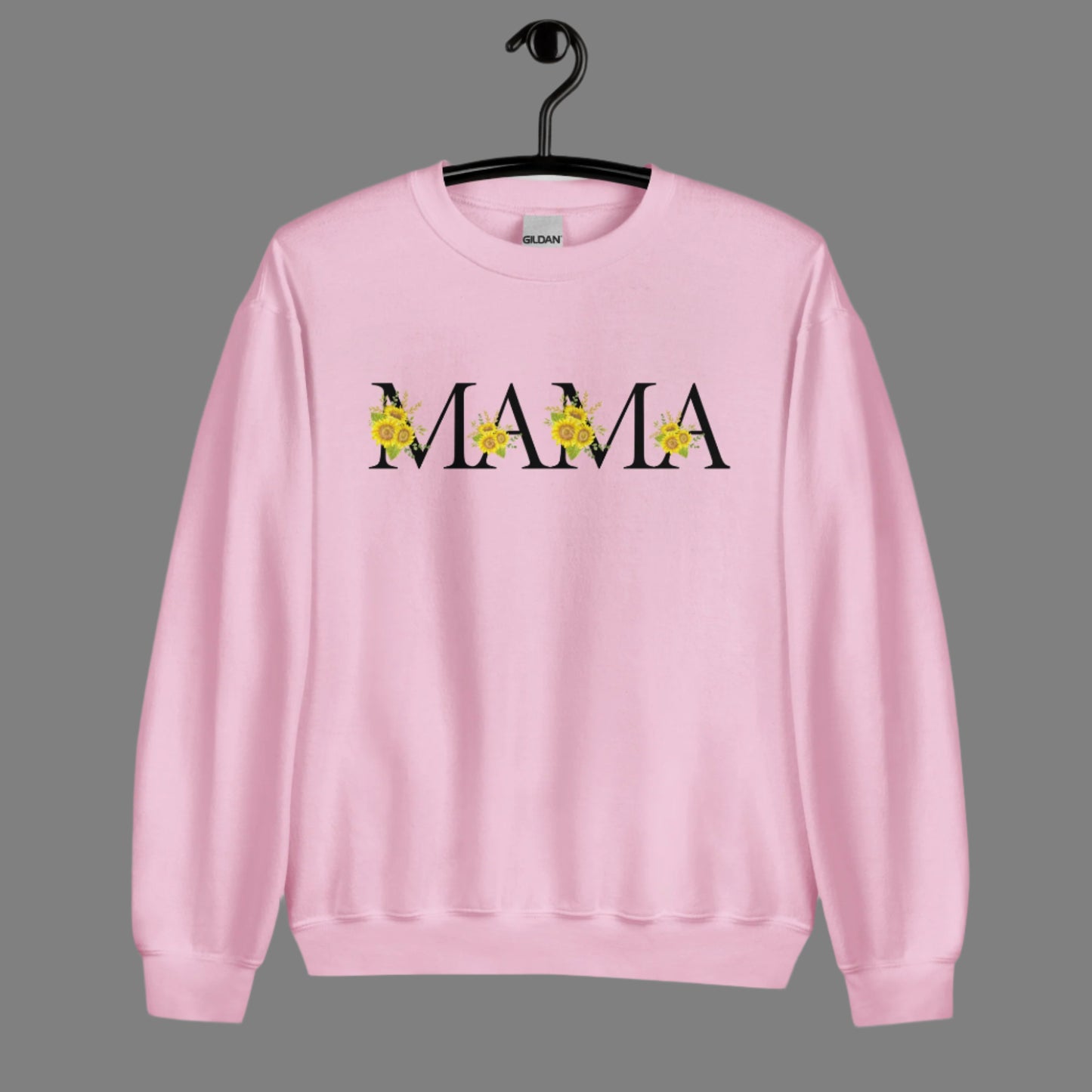 Image: MAMA sunflower tshirt, available in white, light pink and ash. This pullover crewneck features the word MAMA in large black block letters with sunflower calligraph accent. A great baby announcement gift or Mothers day present by jaecrece