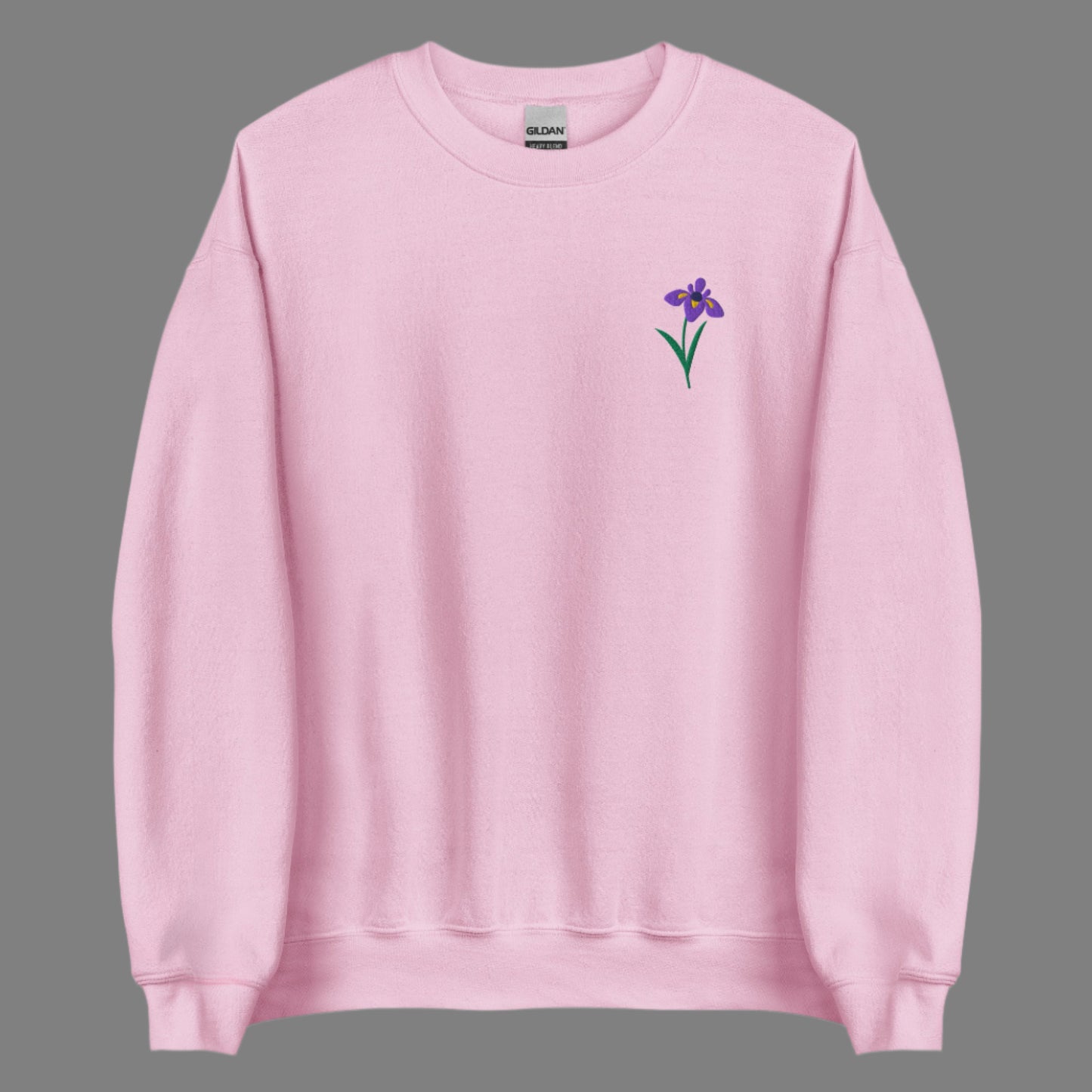 Image: A beautifully embroidered iris flower crewneck sweatshirt in a soft, relaxed fit. This custom floral design adds an elegant touch to any wardrobe, making it a meaningful Mother's Day gift or a thoughtful present for nature lovers. The intricate embroidery captures the essence of the bearded iris, creating a timeless piece that celebrates botanical beauty and personal style, by jaecrece.
