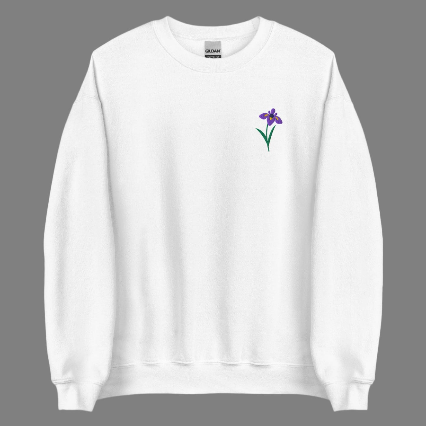 Image: A beautifully embroidered iris flower crewneck sweatshirt in a soft, relaxed fit. This custom floral design adds an elegant touch to any wardrobe, making it a meaningful Mother's Day gift or a thoughtful present for nature lovers. The intricate embroidery captures the essence of the bearded iris, creating a timeless piece that celebrates botanical beauty and personal style, by jaecrece.
