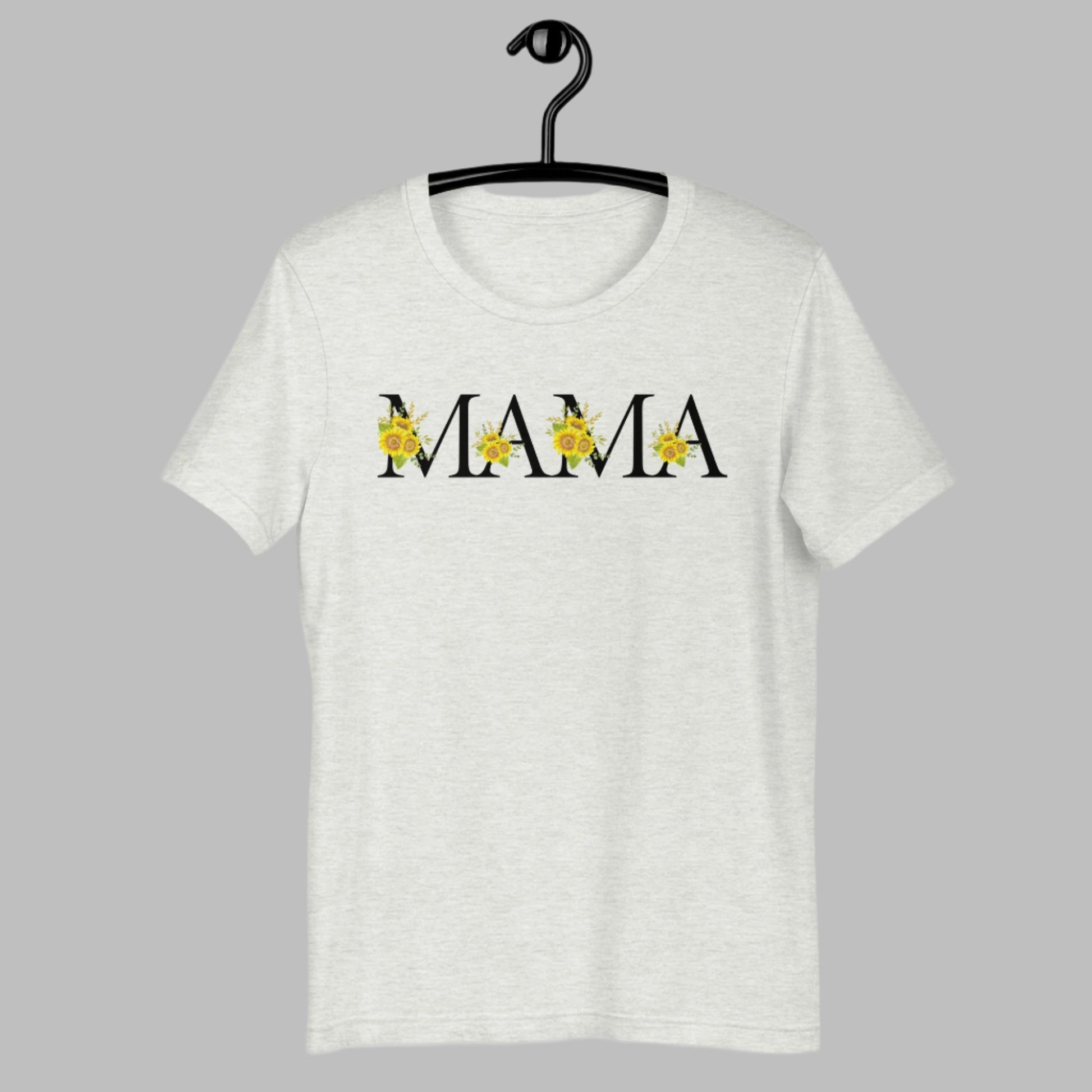 Image: MAMA sunflower tshirt, available in white, light pink and ash. This pullover crewneck features the word MAMA in large black block letters with sunflower calligraph accent. A great baby announcement gift or Mothers day present by jaecrece