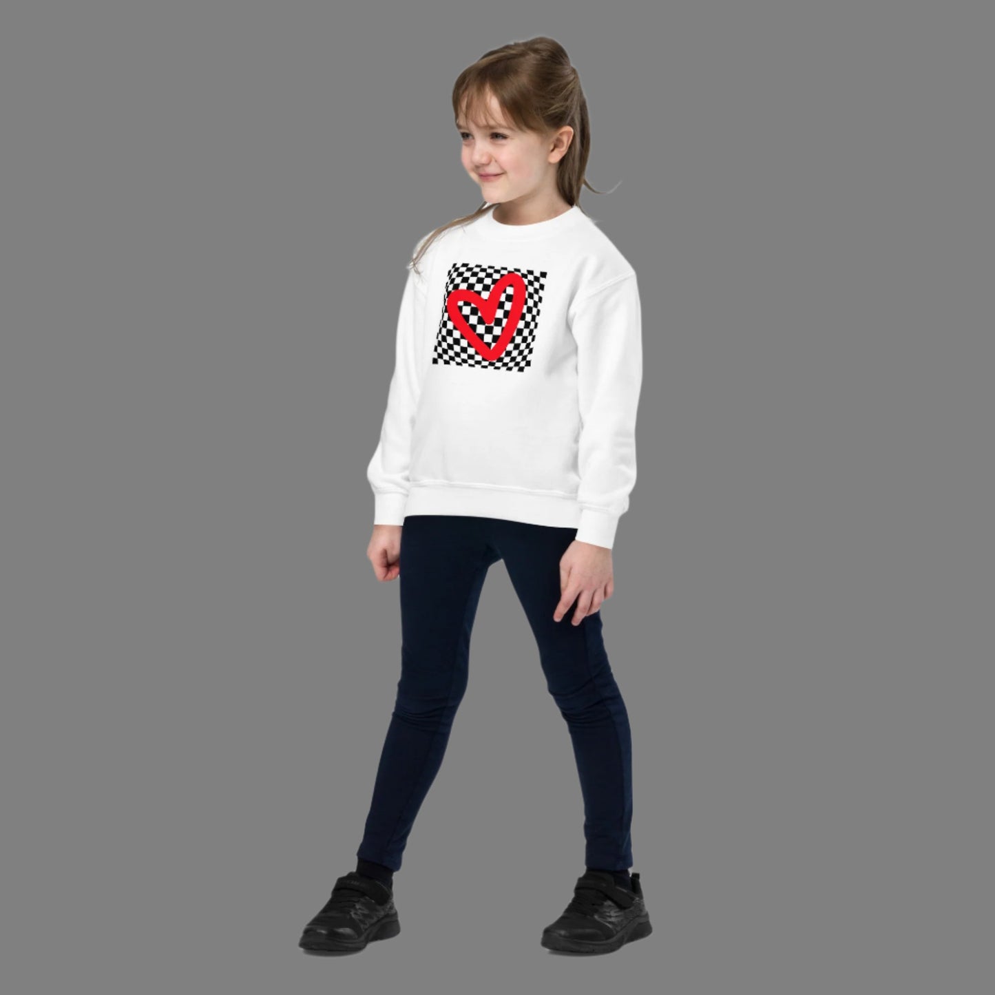 Checkerboard Love Youth Sweatshirt, features a retro black and checker optical illusion pattern with a red heart. Perfect as a gift for Valentine's Day! Matching shirts, baby bodysuits available in baby, child and adult sizes, by jaecrece