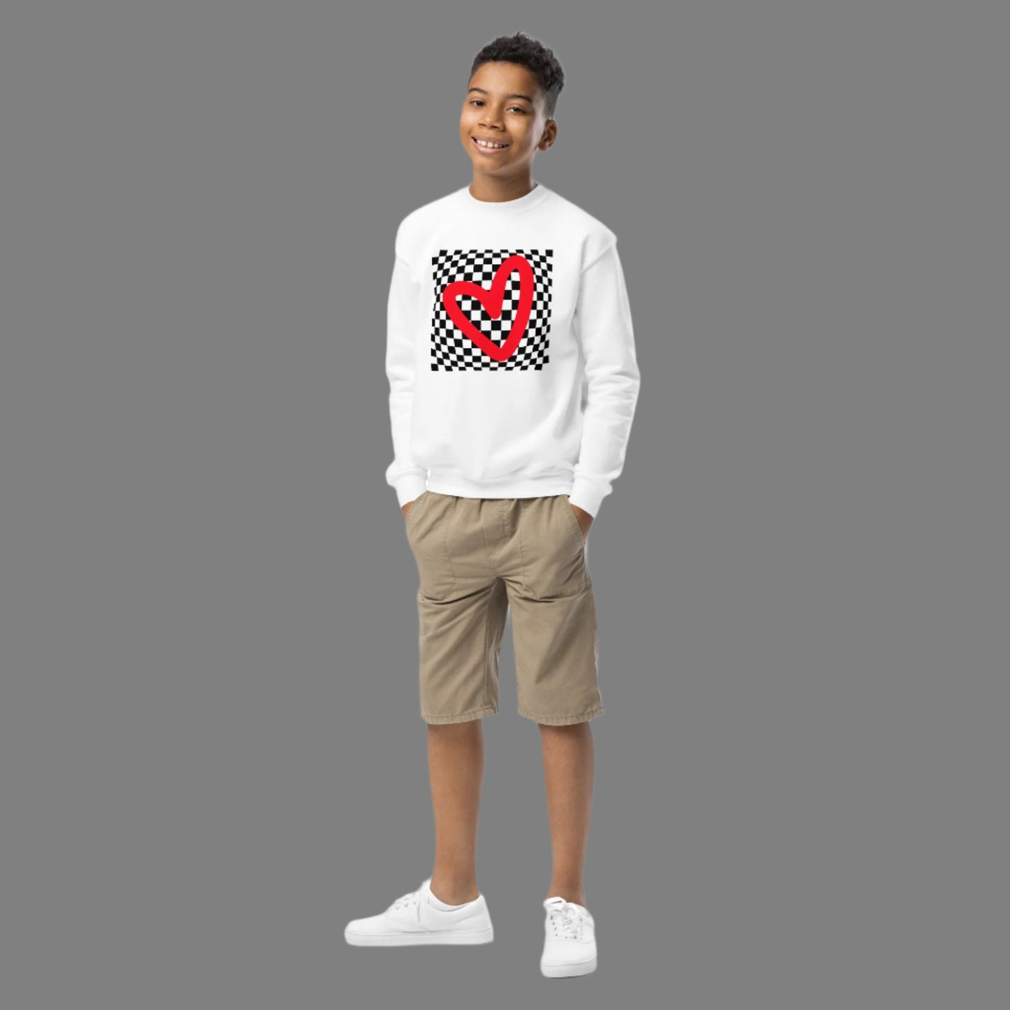 Checkerboard Love Youth Sweatshirt, features a retro black and checker optical illusion pattern with a red heart. Perfect as a gift for Valentine's Day! Matching shirts, baby bodysuits available in baby, child and adult sizes, by jaecrece