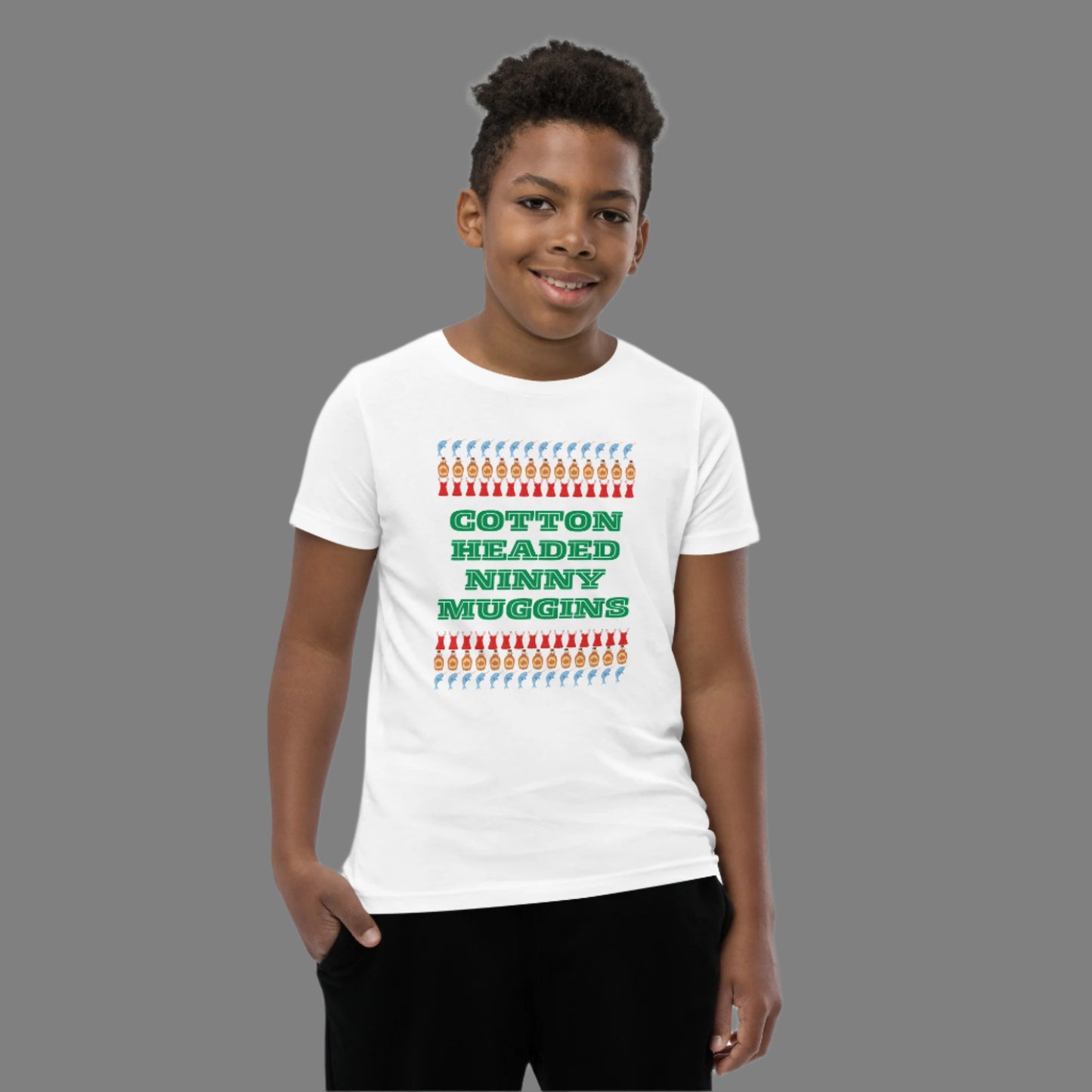 “Cotton Headed Ninny Muggins” youth tee in soft cotton fabric, designed for comfort and holiday fun. This short sleeve kids’ Christmas t-shirt is breathable and pre-shrunk for a perfect fit. Ideal for boys and girls attending holiday parties, Elf movie marathons, or Christmas family photos. Makes a playful and cozy gift for little ones who love festive humor.
