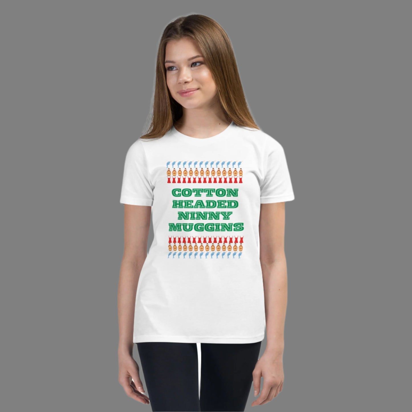 Youth short sleeve t-shirt featuring the funny “Cotton Headed Ninny Muggins” quote from the Elf movie. Made from soft, breathable cotton, this kids’ Christmas shirt is perfect for holiday parties, festive family gatherings, or casual everyday wear. A cozy and playful gift idea for boys and girls who love holiday humor and comfortable, stylish seasonal apparel.
