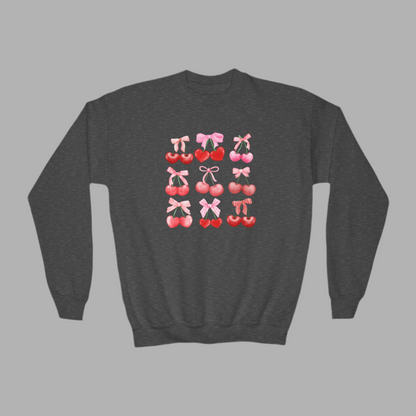 Image: Cherry Bow Girls Sweatshirt, available in Hot pink, White and dark gray. This coquette aesthetic shirt features 9 different cherries with bows, making a large soft girly graphic. Makes a great Valentines gift for toddlers and little girls, by jaecrece