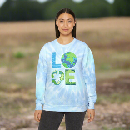 Image: LOVE Earth Blue Tie Dye Sweatshirt, perfect for Earth Day, the letters in LOVE represent our planets oceans, Mother Earth, Reduce, Reuse Recycle, and our plants and trees. This graphic is printed on a blue tie dye crewneck sweatshirt, by jaecrece