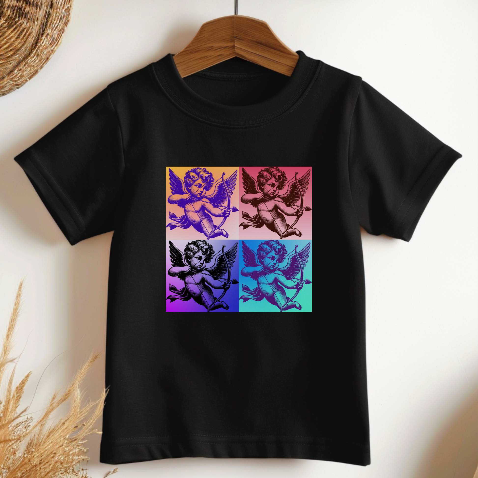 Designed for little ones who love pop culture and retro style, this Pop Art Cupid Toddler T-shirt features a vintage Cupid graphic that brings artsy flair to any outfit. Available in sizes 2T-5T and colors Black, White, and Pink, this t-shirt offers a comfortable fit with breathable fabric and durability for active toddlers. Whether it’s a fun casual look, Valentine’s Day theme, or family matching outfit, this Cupid graphic tee is the perfect way to show off their unique style.