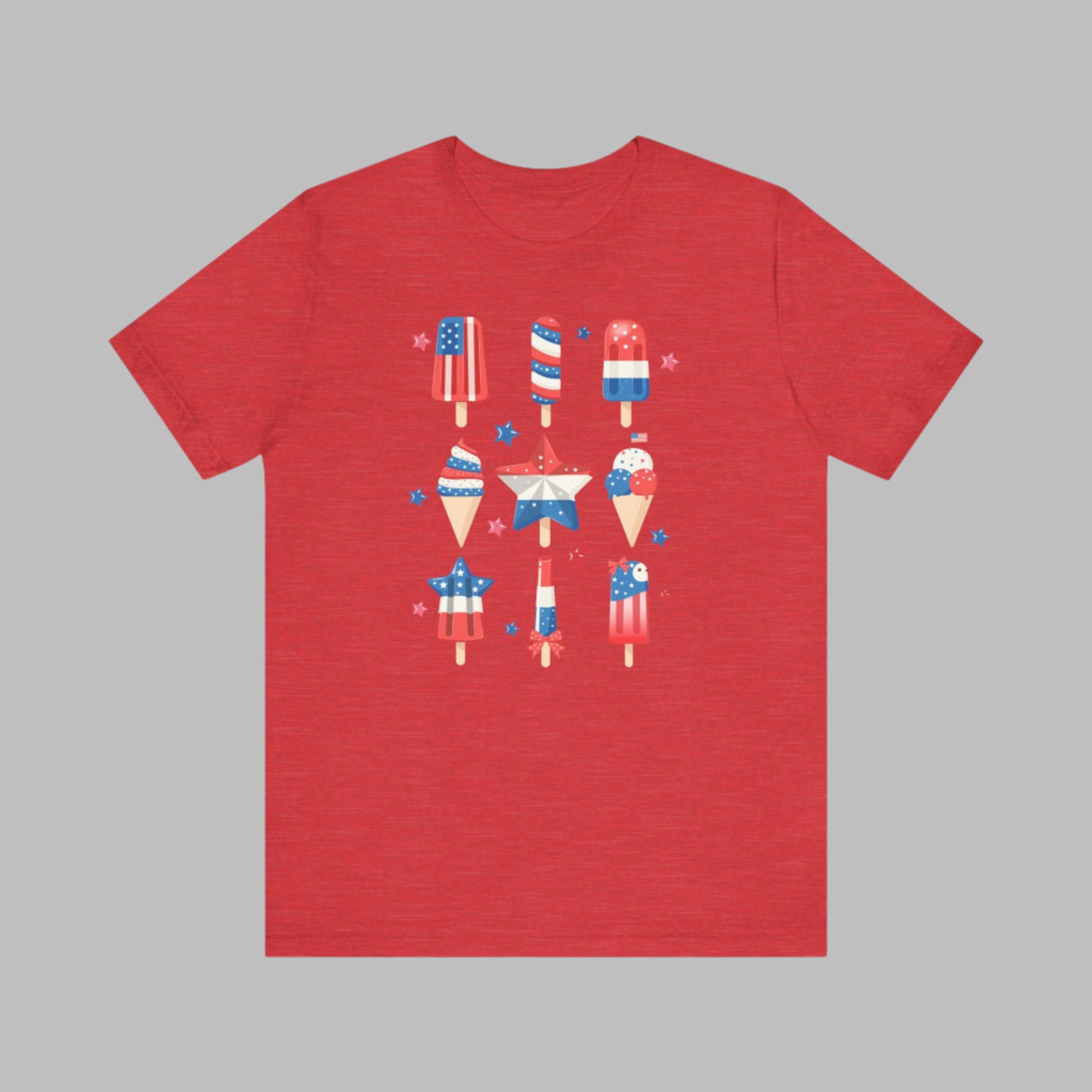 Image: From fireworks to festivals, this red white and blue popsicle shirt is your go to for every patriotic event. Created for adults and available in sizes XS to 5XL, this fun and festive tee celebrates the 4th of July with comfort and flair. Whether you’re honoring Memorial Day or joining a parade, this soft American pride shirt is a summertime staple, by jaecrece.