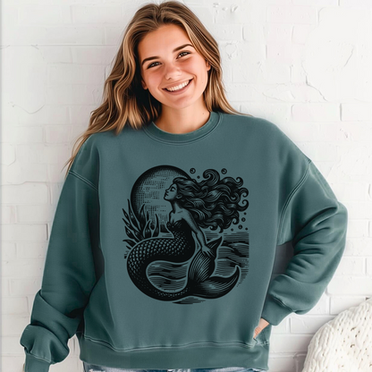 Image: Mermaid  Sweatshirt, Vintage Ocean Vibes Sweatshirt. Pullover crewneck features large black graphic with mermaid in front of the moon, in the ocean waves. Gift for women and teens who love a vintage ocean aesthetic and mermaidcore, by jaecrece